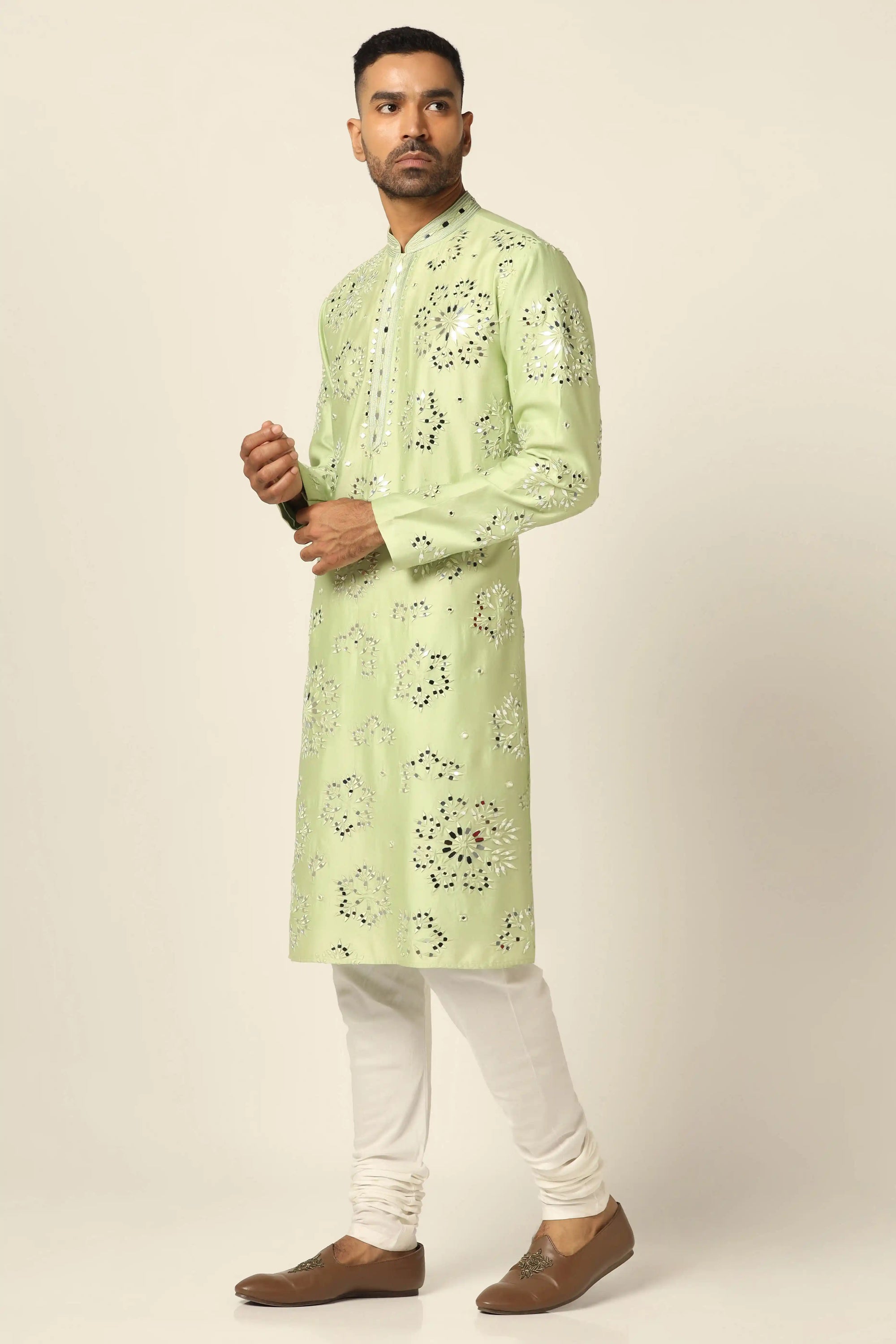 This Kurta Pajama set is crafted from luxurious Chanderi silk fabric. Shop Now!