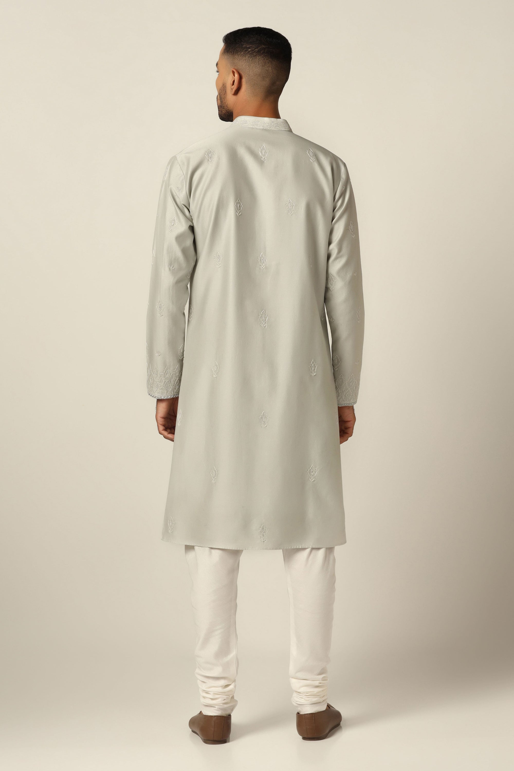 Style with our Chanderi Silk kurta pajama set with intricate thread/machine embroidery. Shop Now!