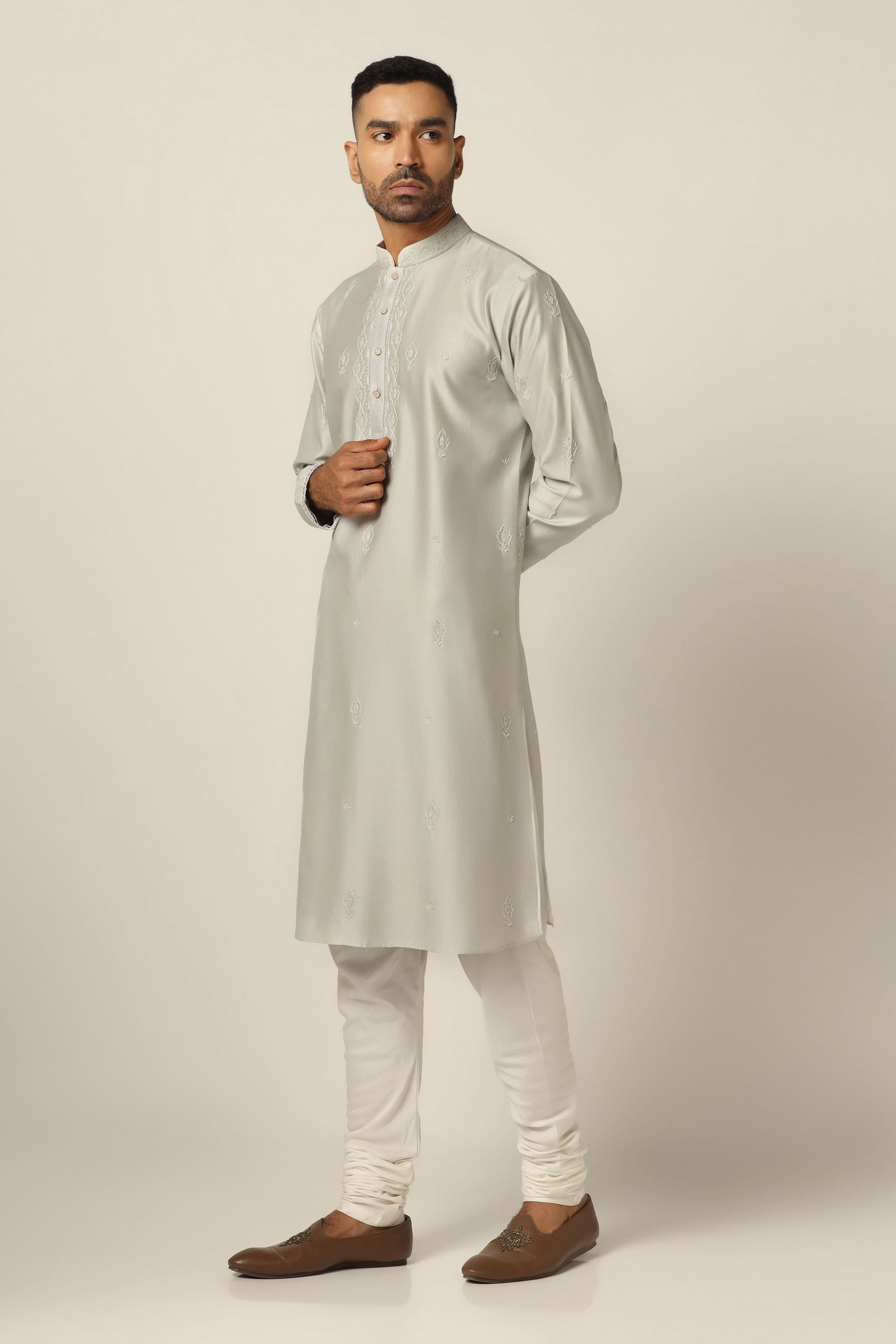 Style with our Chanderi Silk kurta pajama set with intricate thread/machine embroidery. Shop Now!
