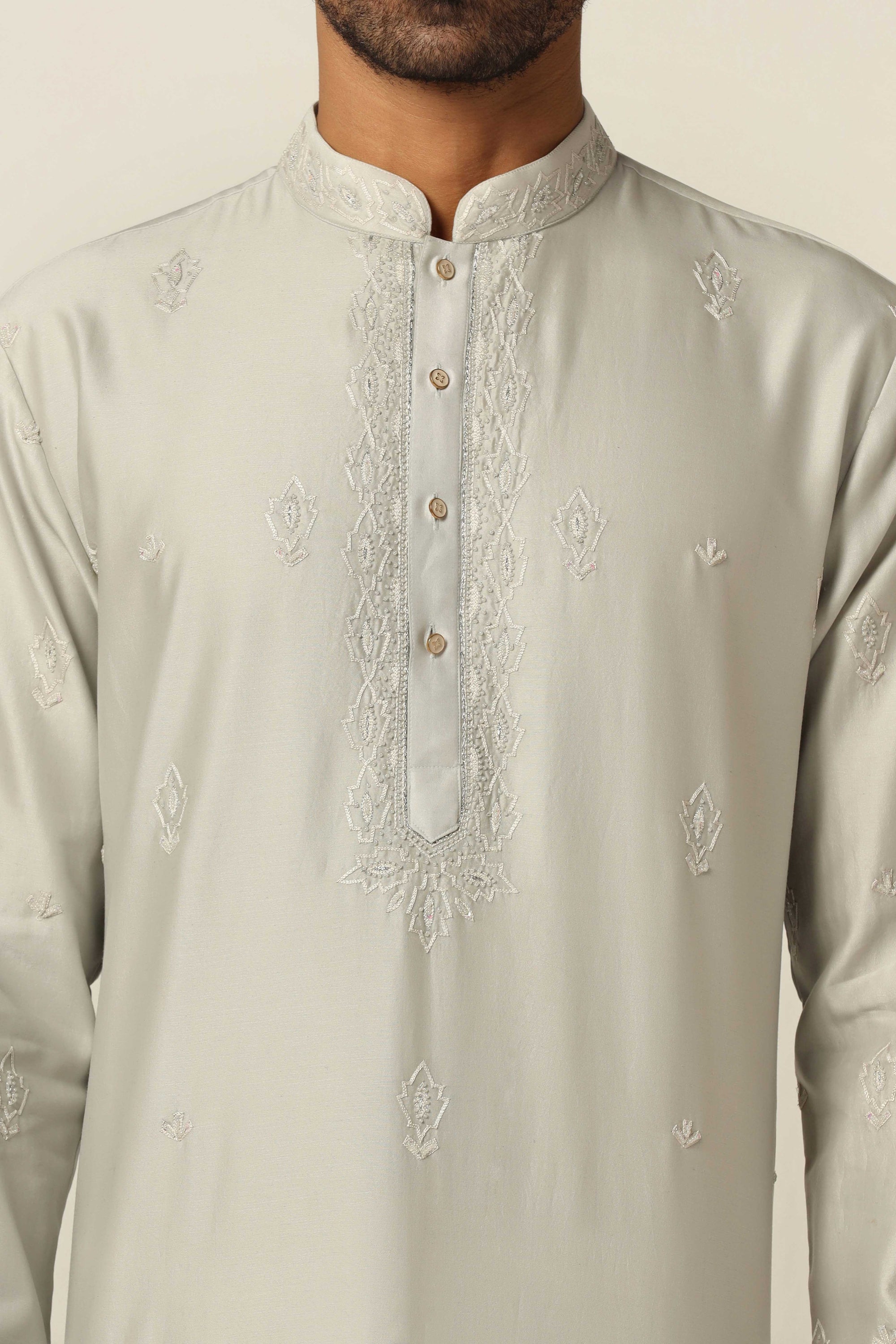 Style with our Chanderi Silk kurta pajama set with intricate thread/machine embroidery. Shop Now!