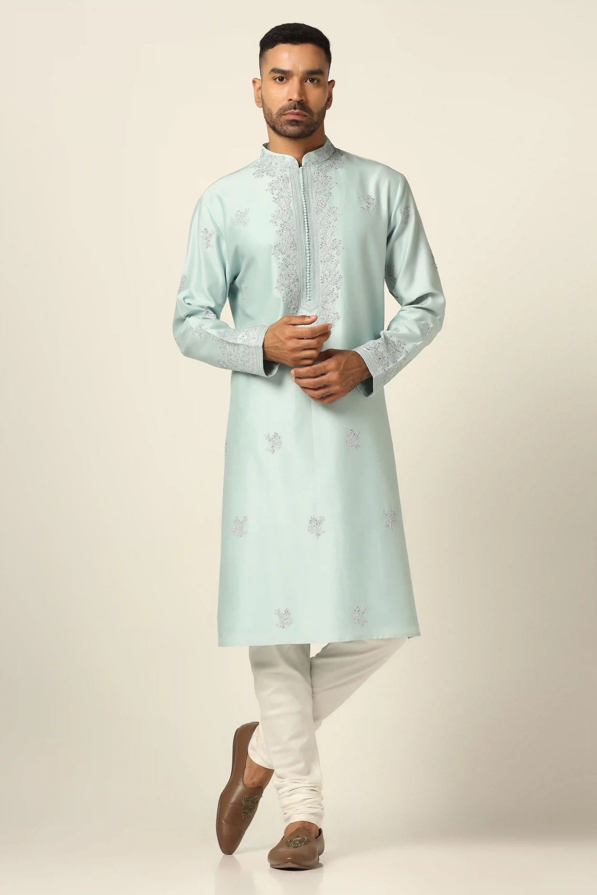 This Chanderi Silk kurta set exudes elegance with its intricate thread embroidery. Shop Now!