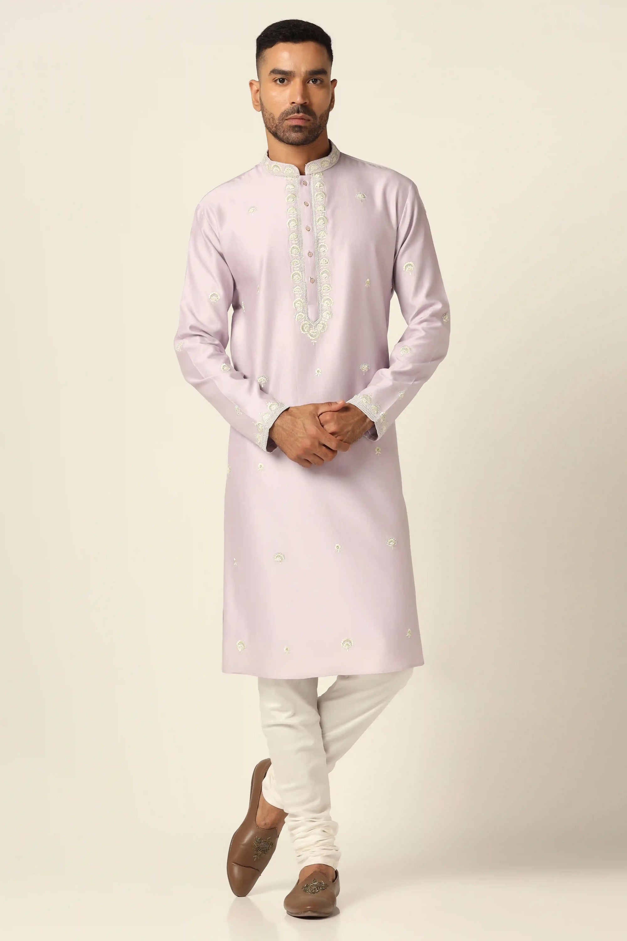 Experience our chanderi silk Kurta set, adorned with intricate thread/machine embroidery. Shop Now!