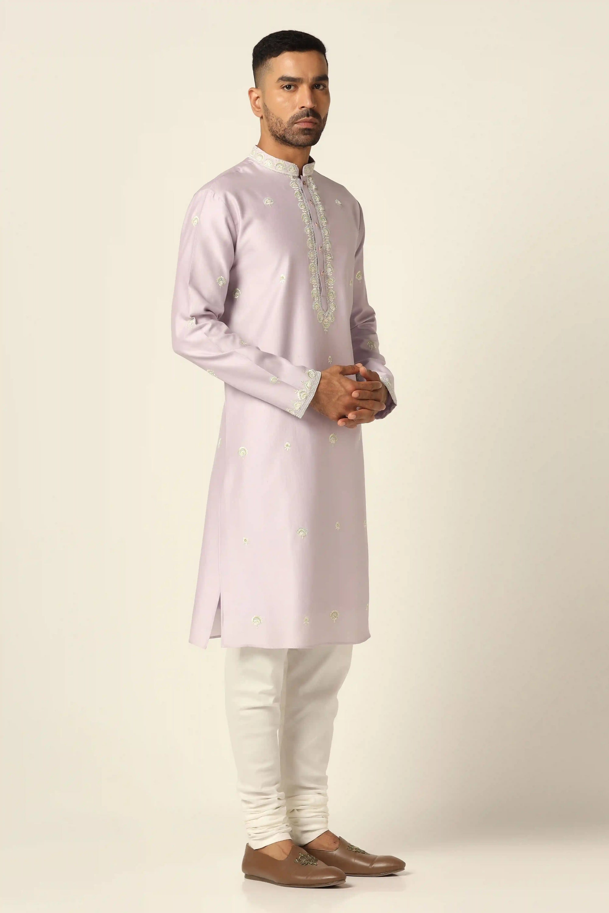 Experience our chanderi silk Kurta set, adorned with intricate thread/machine embroidery. Shop Now!