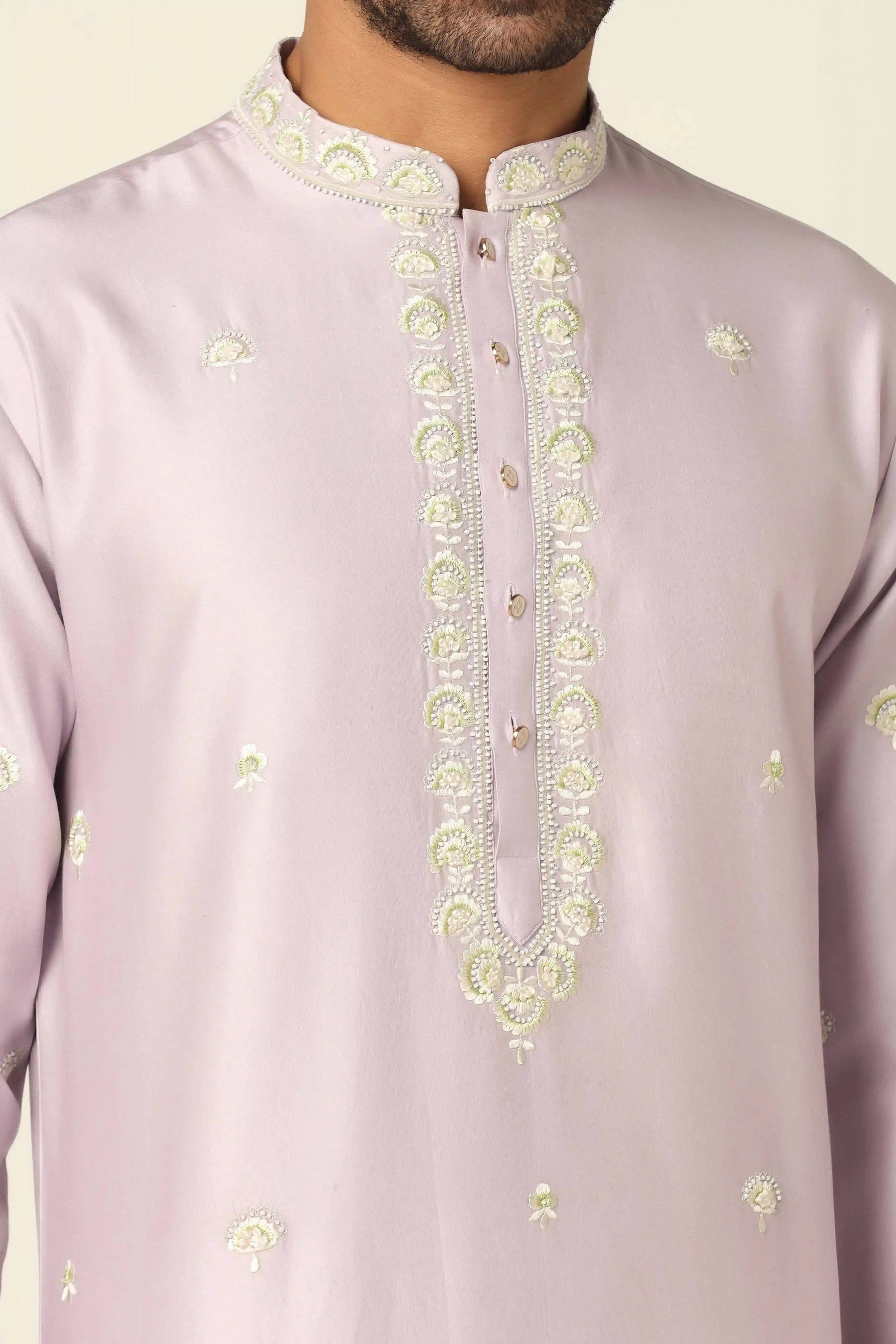 Experience our chanderi silk Kurta set, adorned with intricate thread/machine embroidery. Shop Now!