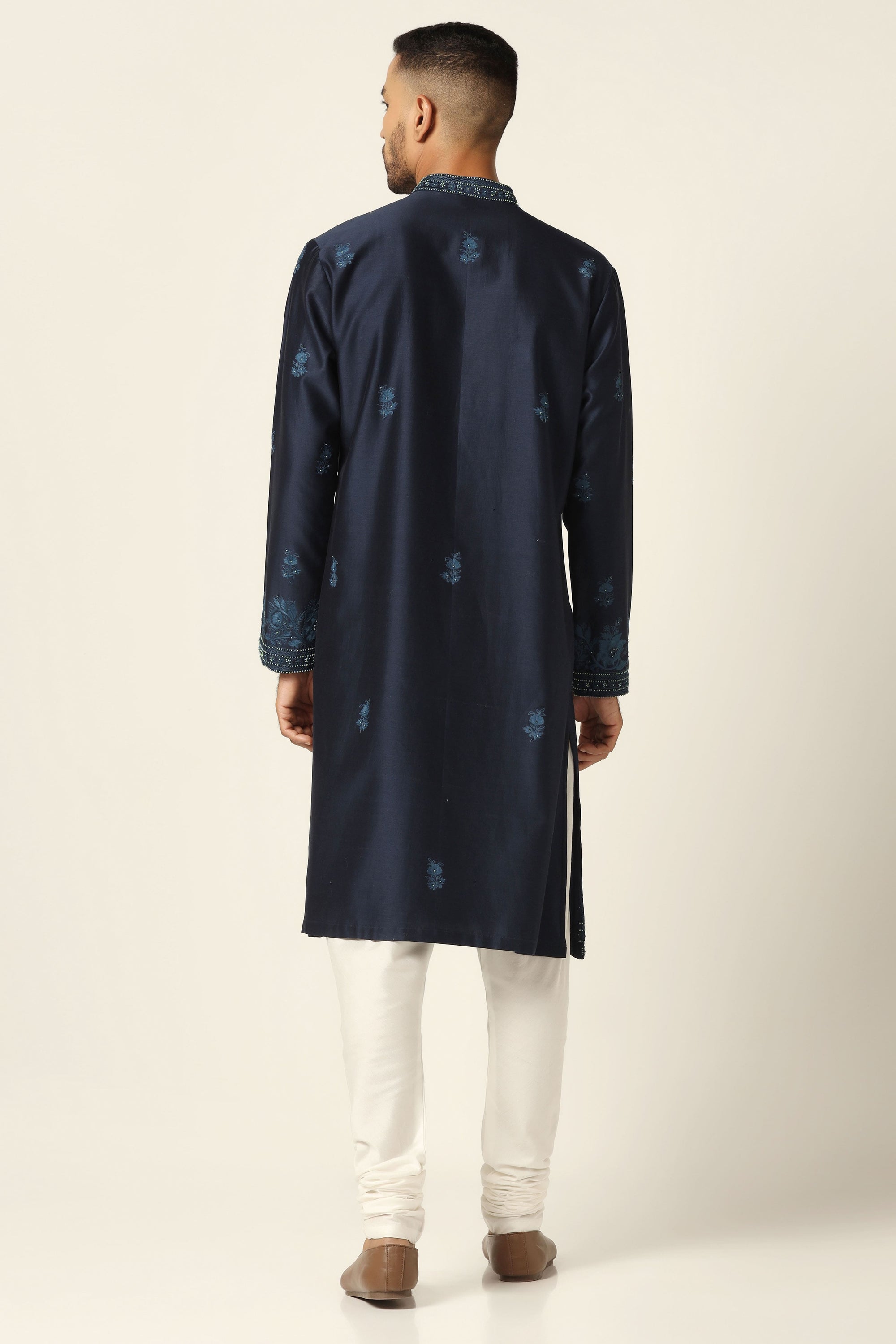 Elevate style with our Chanderi Silk kurta set, adorned with intricate thread embroidery. Shop Now!