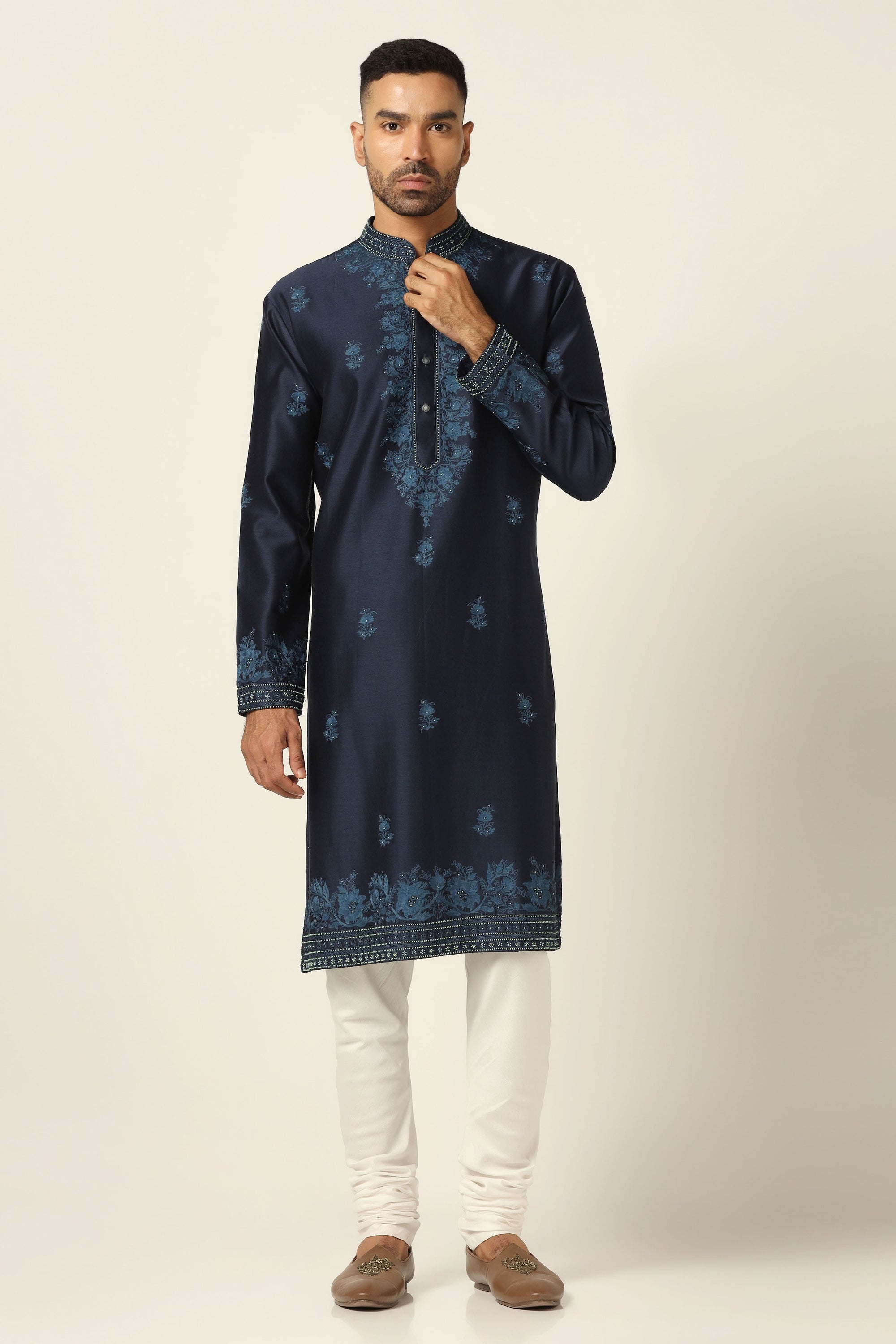 Elevate style with our Chanderi Silk kurta set, adorned with intricate thread embroidery. Shop Now!