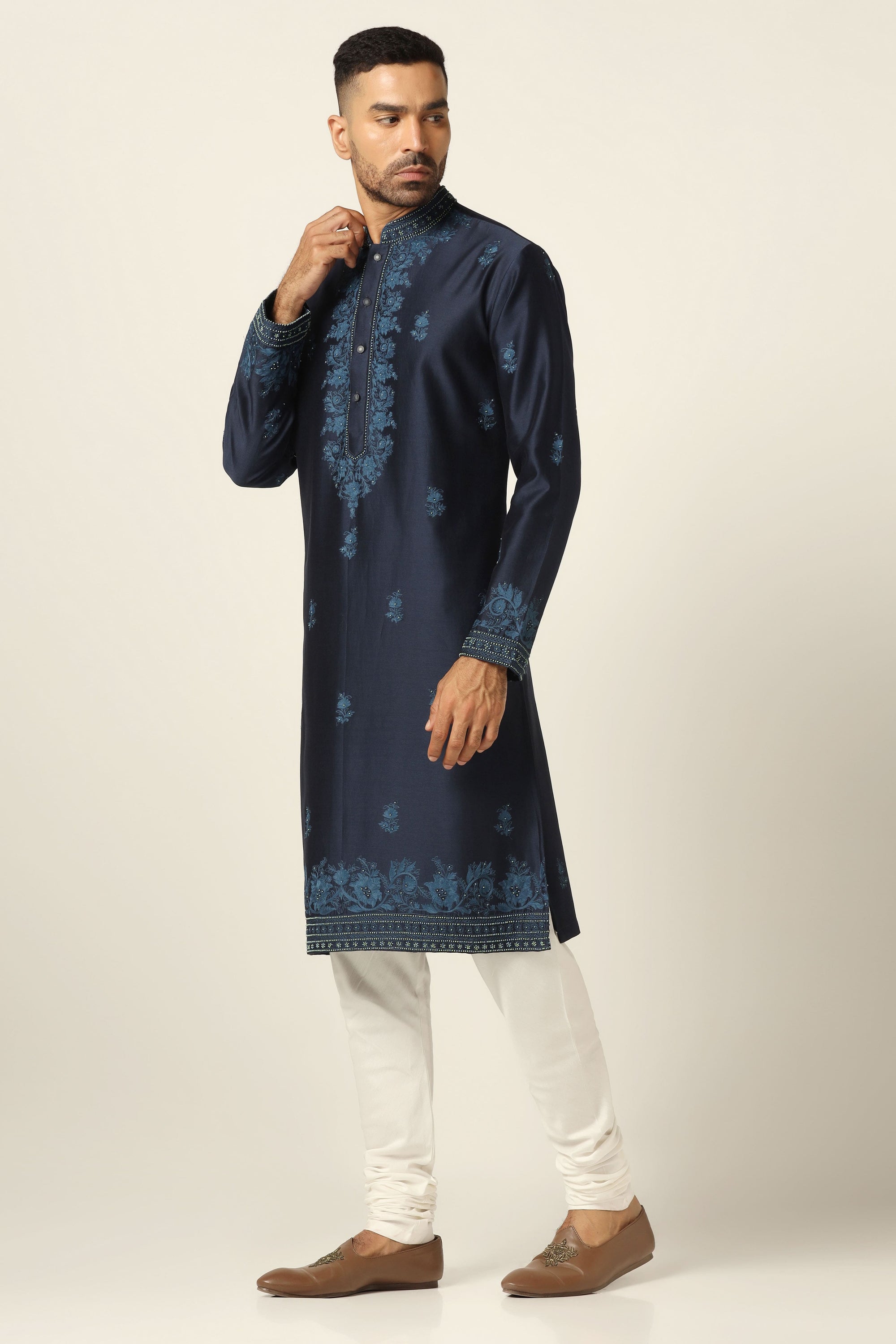 Elevate style with our Chanderi Silk kurta set, adorned with intricate thread embroidery. Shop Now!