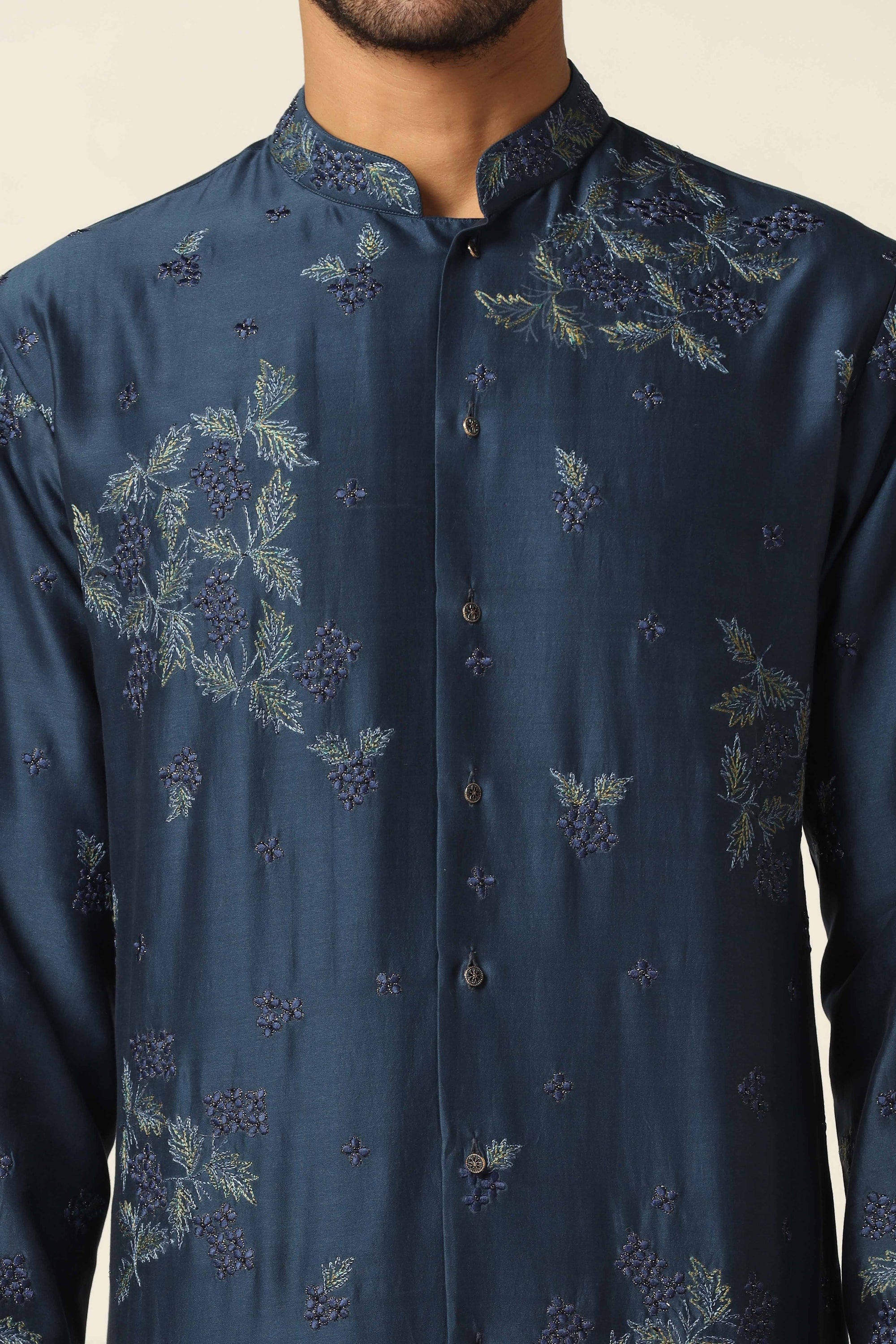 Dress in elegance with our Navy Kurta, adorned with floral thread embroidery. Shop Now!