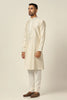 Elegance in simplicity! Crafted from Chanderi silk, this off-white kurta pajama set boasts tonal thread embroidery on the neck, button placket, and scattered motifs for a refined look.