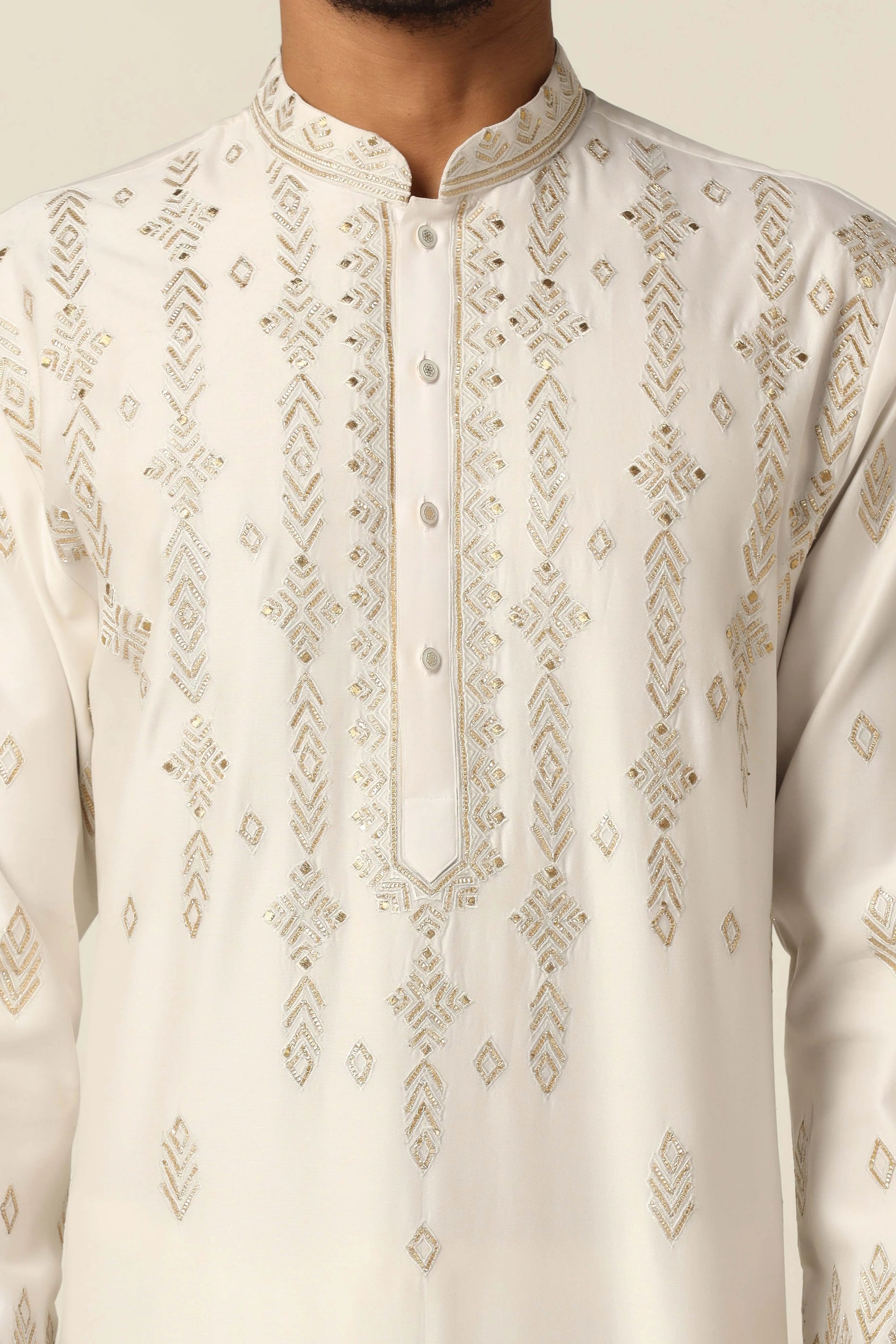 Elevate your ethnic style with this kurta featuring tonal thread embroidery. Shop Now!