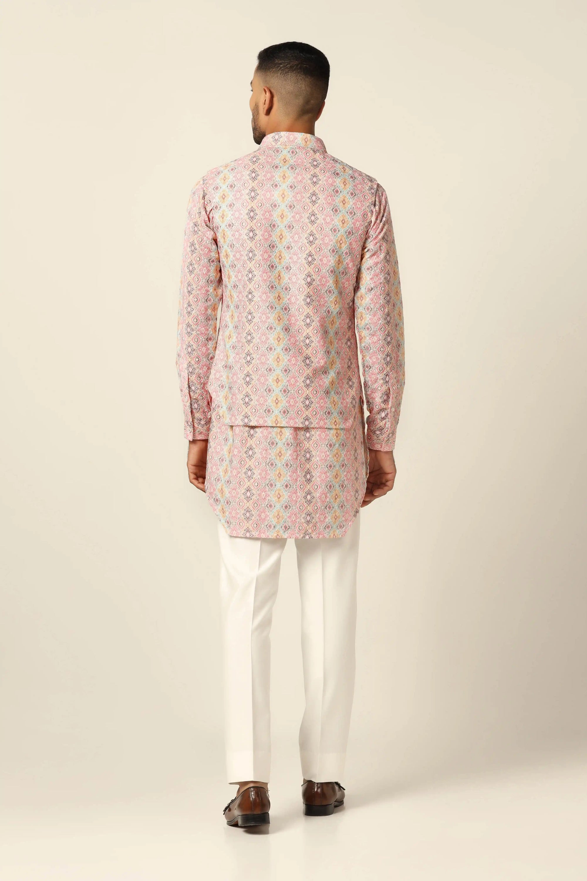 Peach Nehru Set combines timeless design and sophistication for a refined look. Shop now!