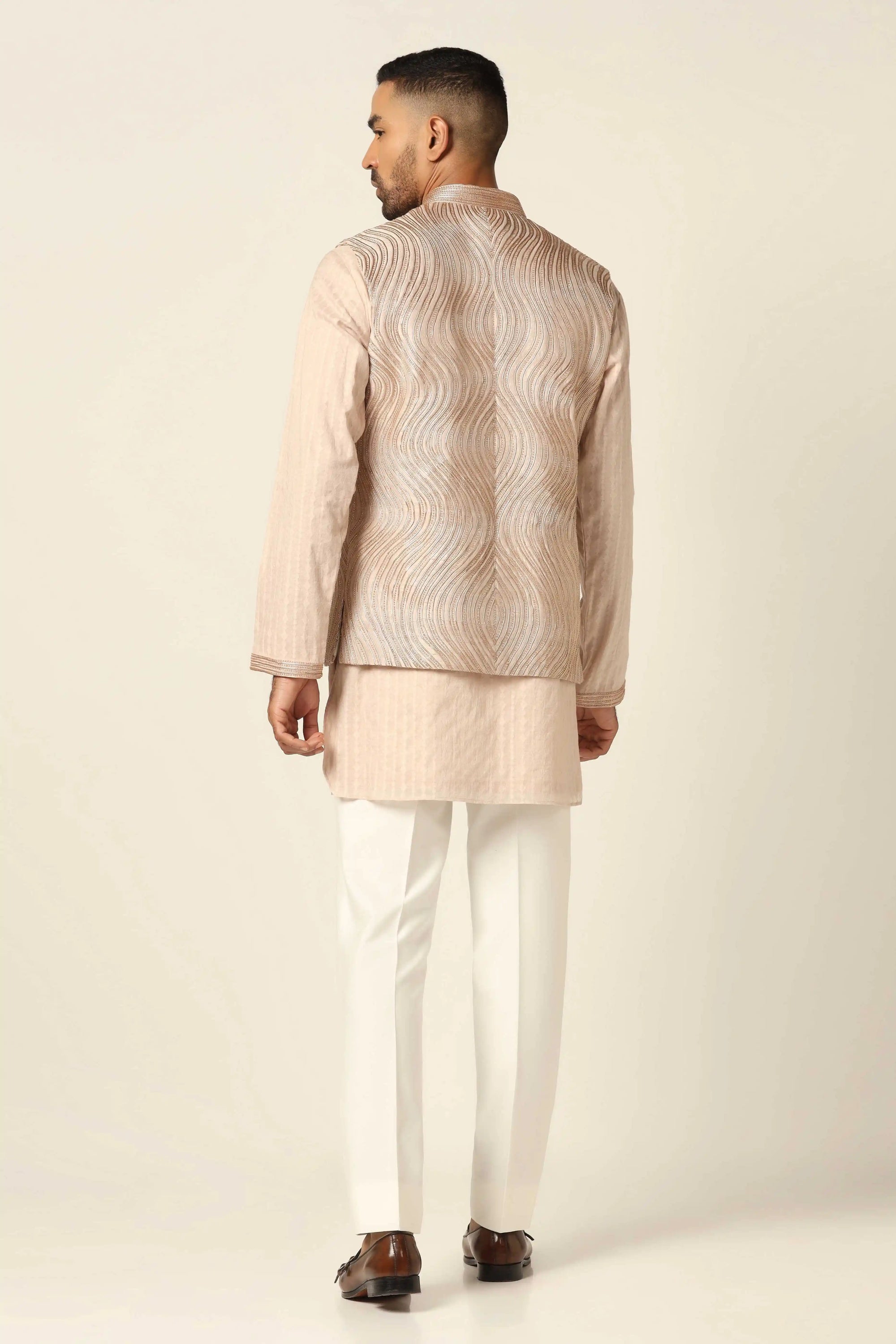 Experience elegance with the Peach Set and embroidered Nehru jacket. Shop Now!