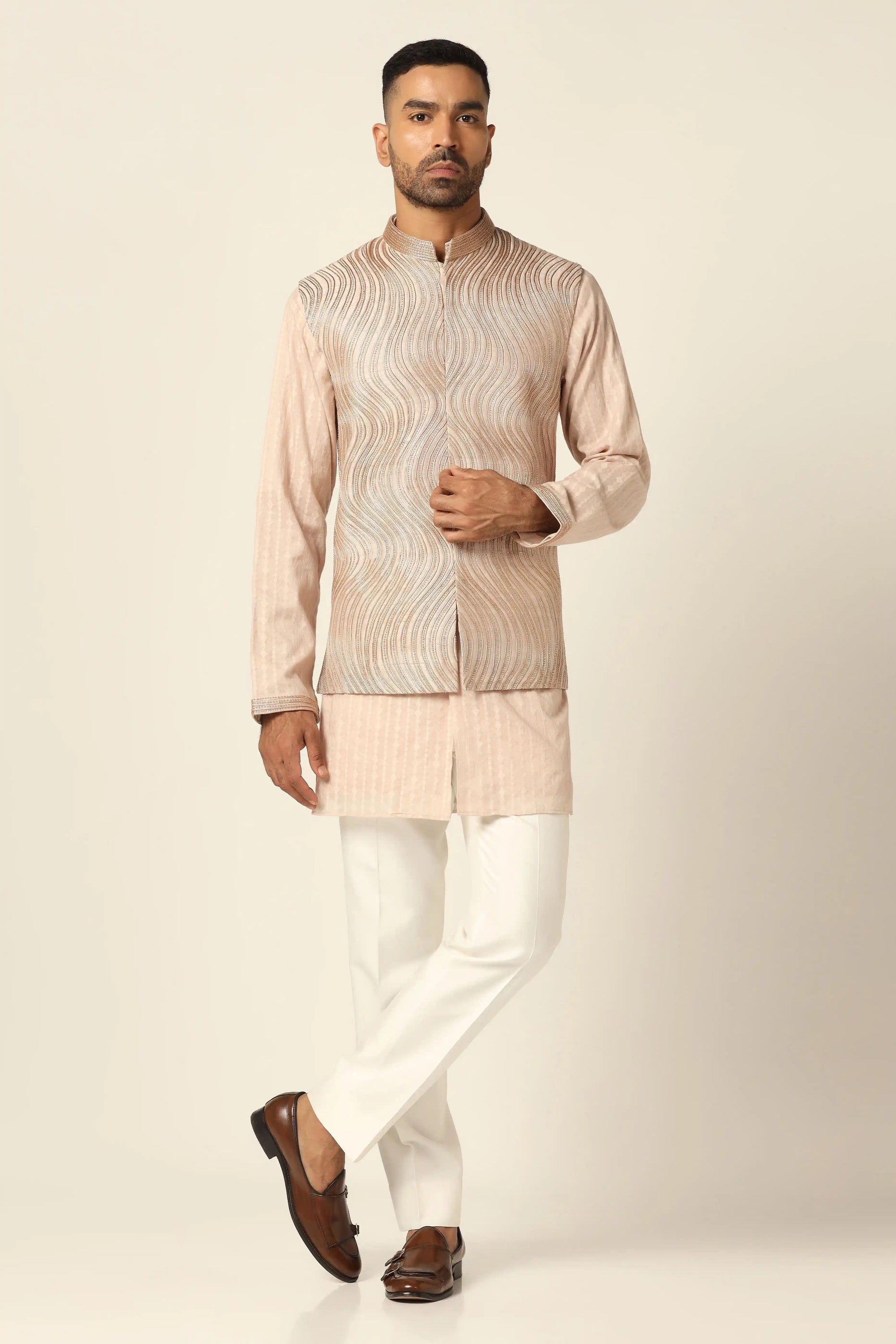 Experience elegance with the Peach Set and embroidered Nehru jacket. Shop Now!