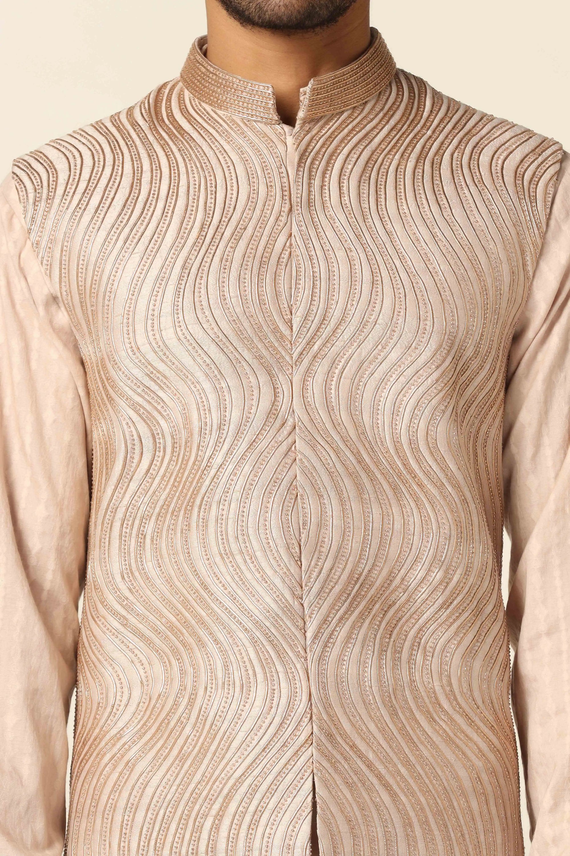 Experience elegance with the Peach Set and embroidered Nehru jacket. Shop Now!