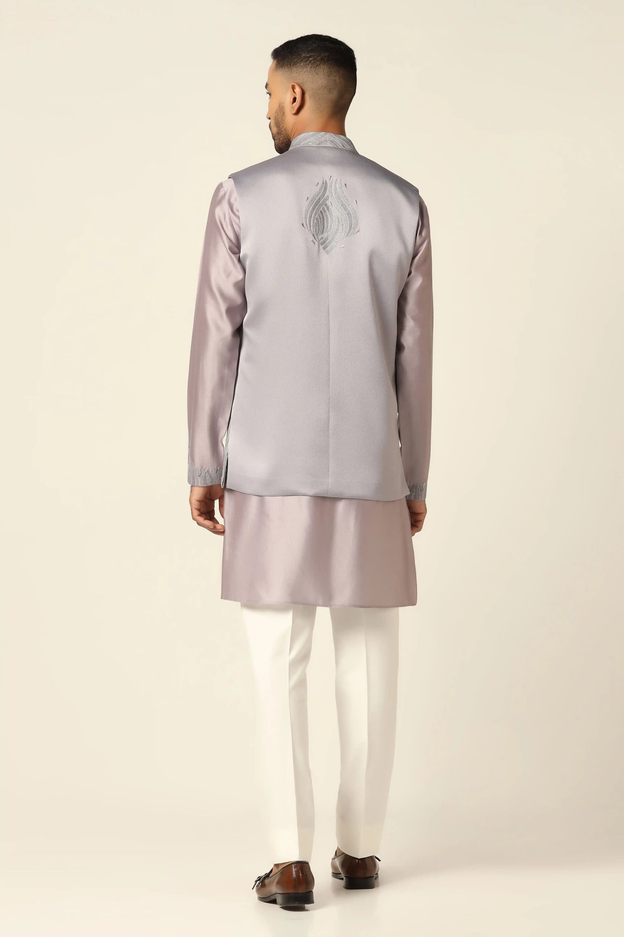 Add elegance to your wardrobe with the Grey Embroidered Nehru Set. Shop Now!