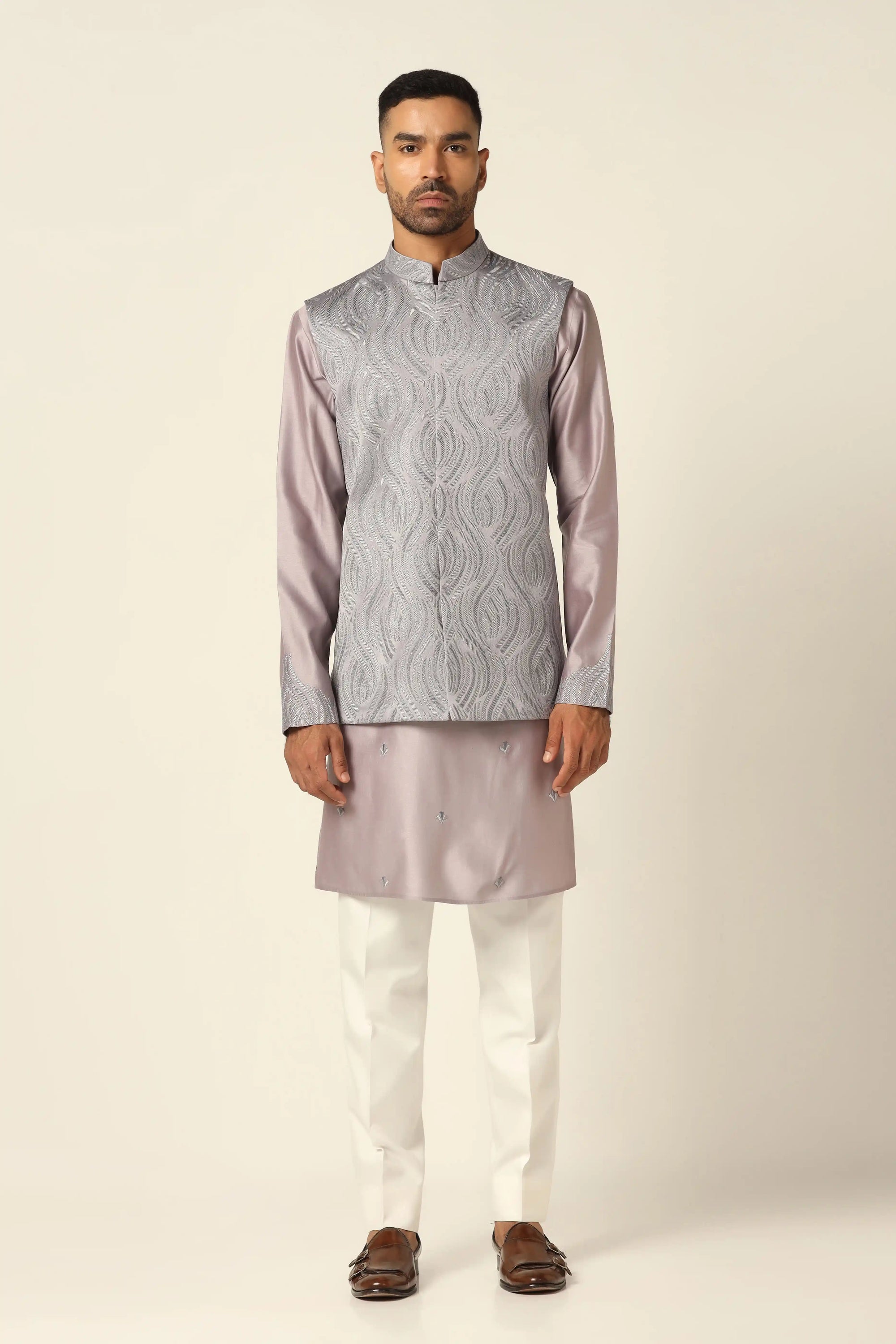 Add elegance to your wardrobe with the Grey Embroidered Nehru Set. Shop Now!