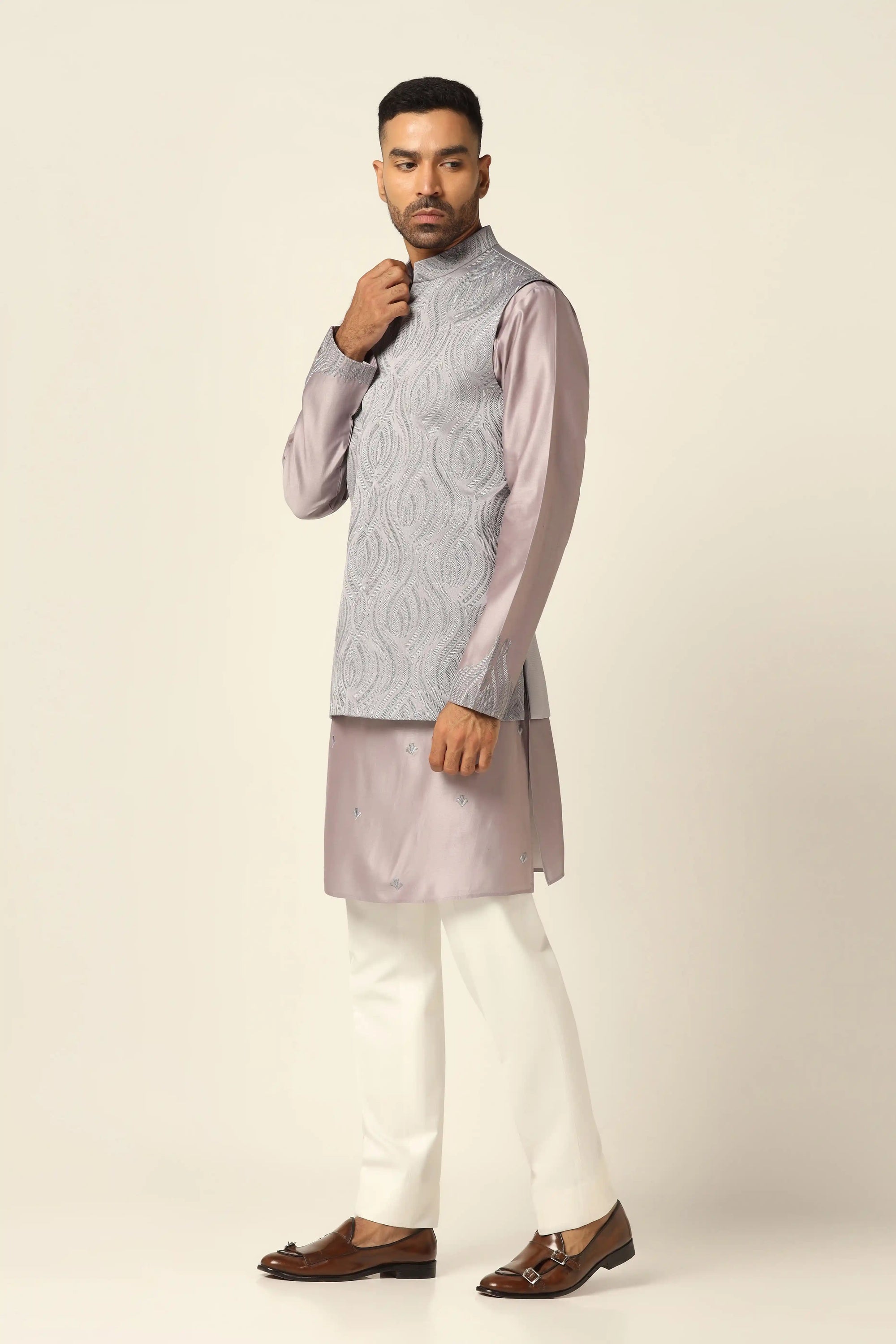 Add elegance to your wardrobe with the Grey Embroidered Nehru Set. Shop Now!