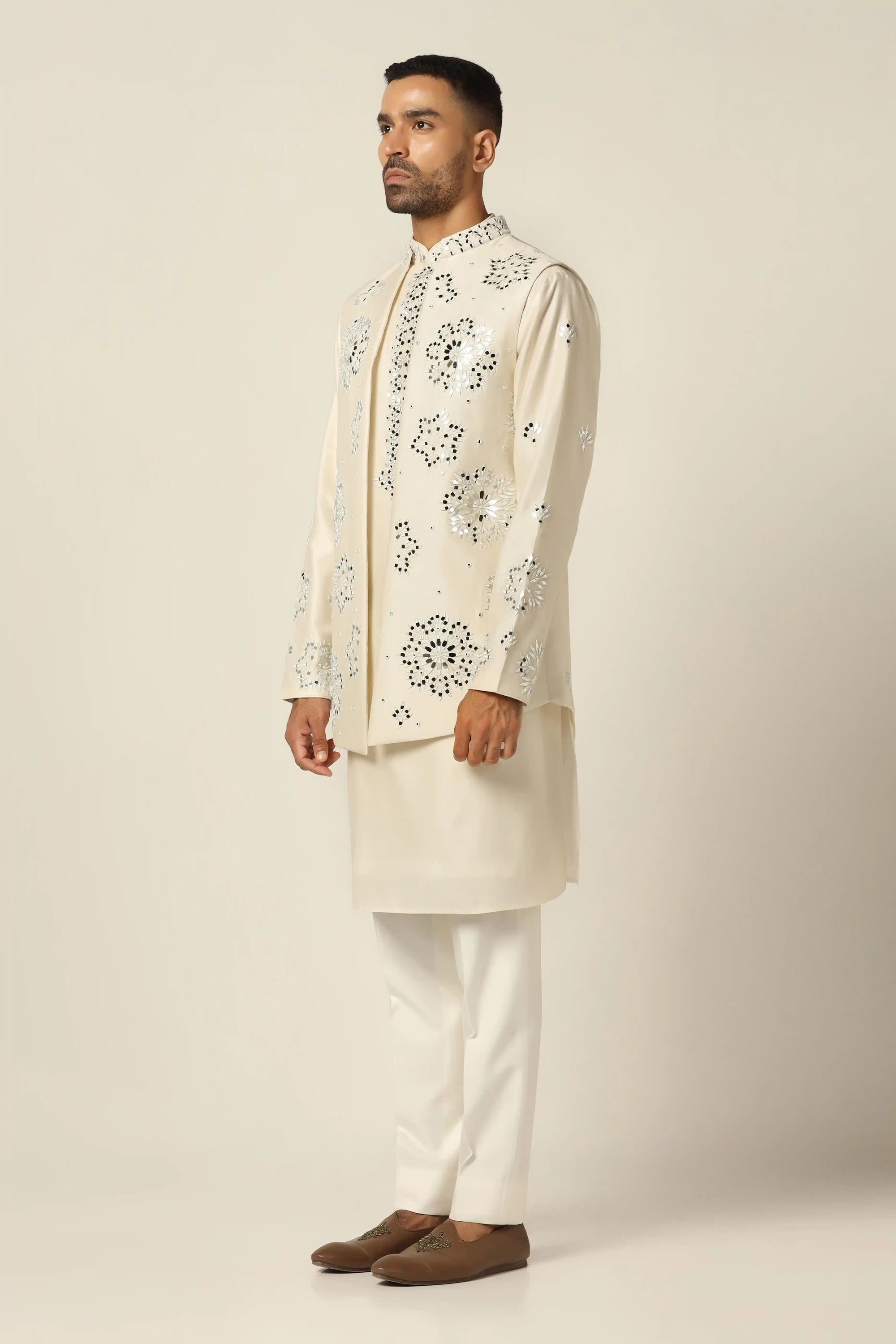 Timeless and elegant, the Off-White Set with Nehru embroidery is perfect for any occasion. Shop now!