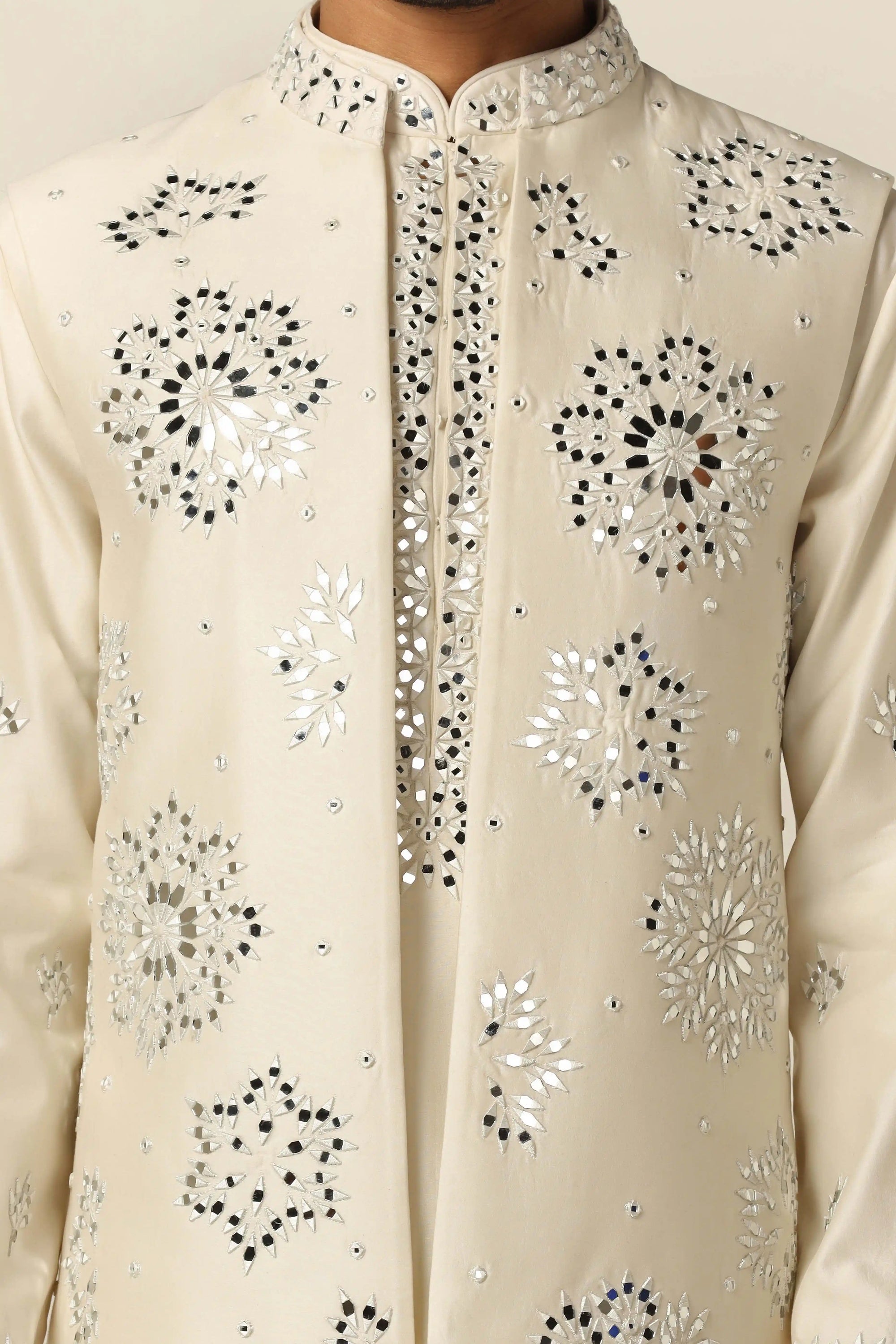 Timeless and elegant, the Off-White Set with Nehru embroidery is perfect for any occasion. Shop now!