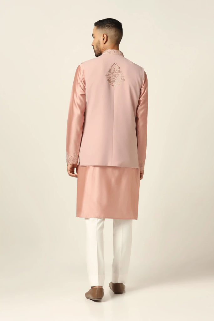 Add elegance to your ensemble with our Nehru set, featuring intricate thread embroidery on the jacket. Paired with a matching kurta and off-white trousers for a refined look.