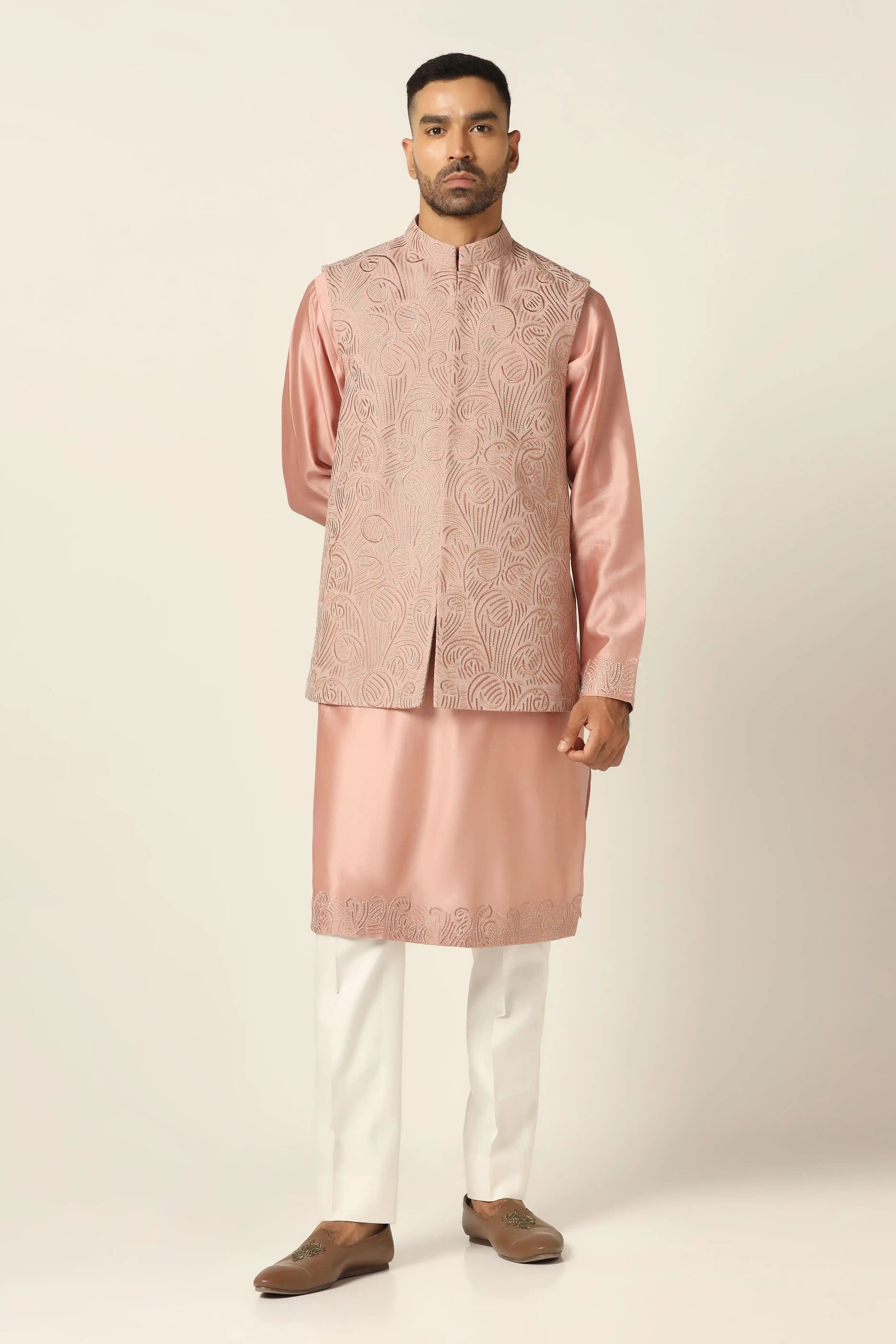 Sophisticated and stylish, the Peach Embroidered Nehru Set is perfect for special moments. Shop now!
