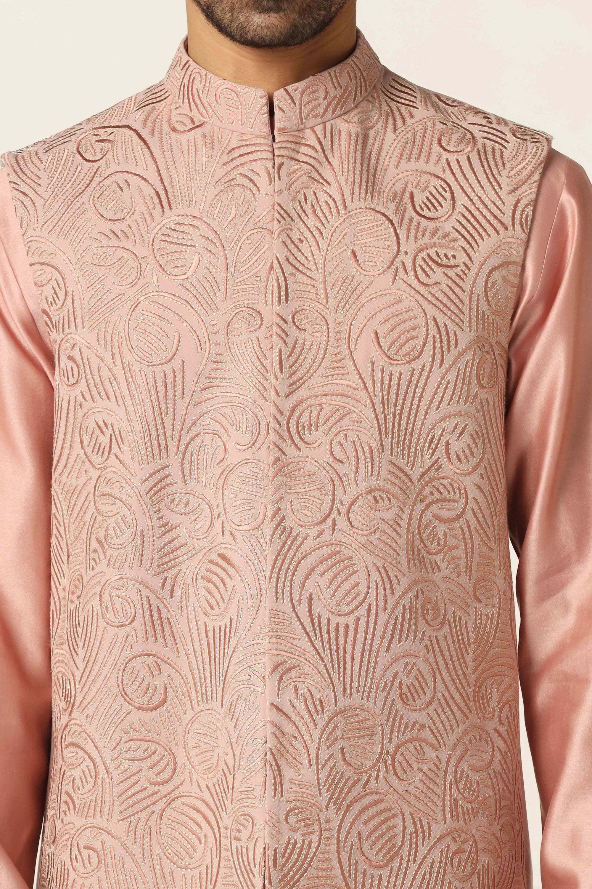 Sophisticated and stylish, the Peach Embroidered Nehru Set is perfect for special moments. Shop now!