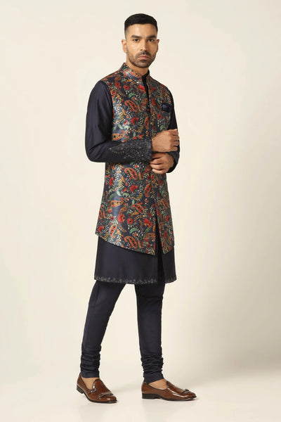 Elevate your ethnic style with our Nehru set featuring intricate floral embroidery. Paired with a navy Kurta and matching pajama for a timeless look.