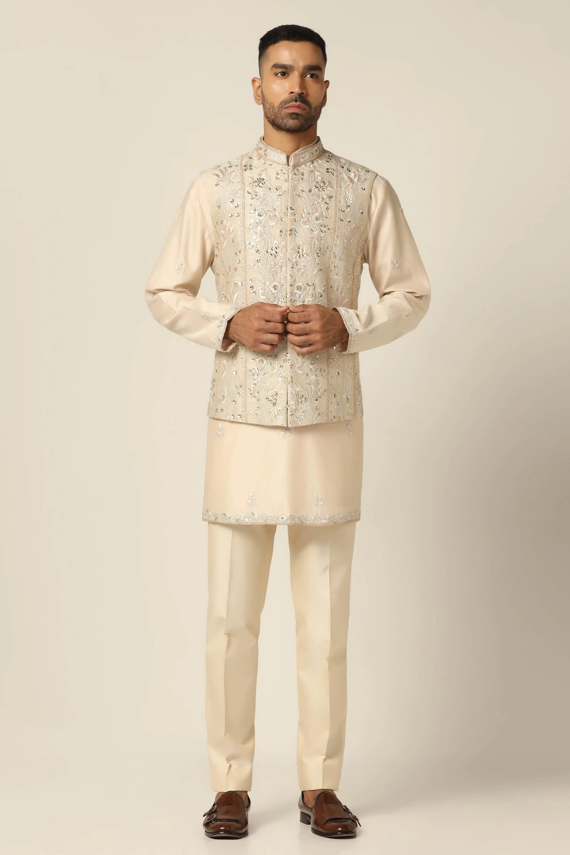 Experience classic elegance with Off-white Nehru Jacket Set. Shop Now!