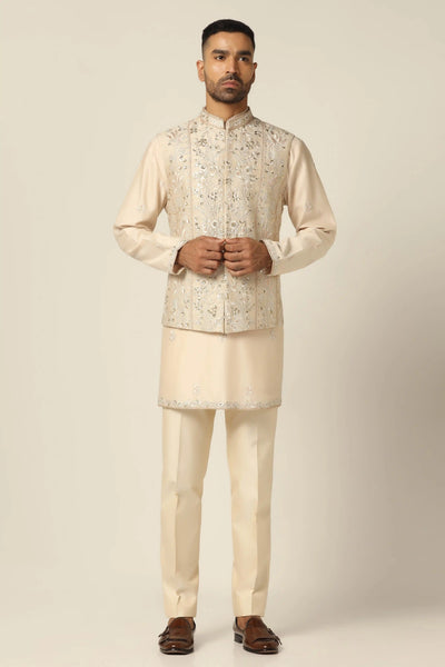 Elevate your ensemble with our Nehru jacket set featuring meticulous machine & hand embroidery. Paired with a matching kurta and trousers for timeless elegance.