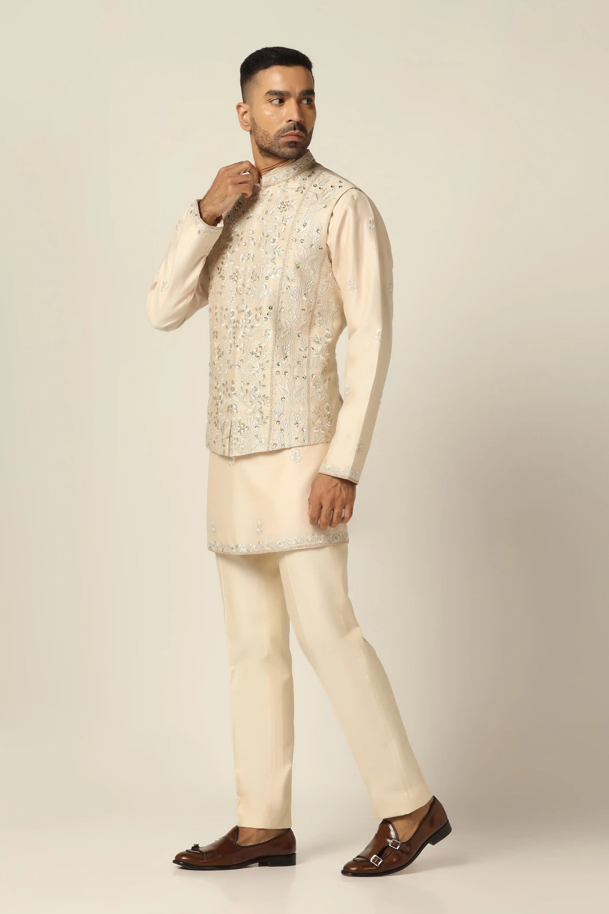 Experience classic elegance with Off-white Nehru Jacket Set. Shop Now!