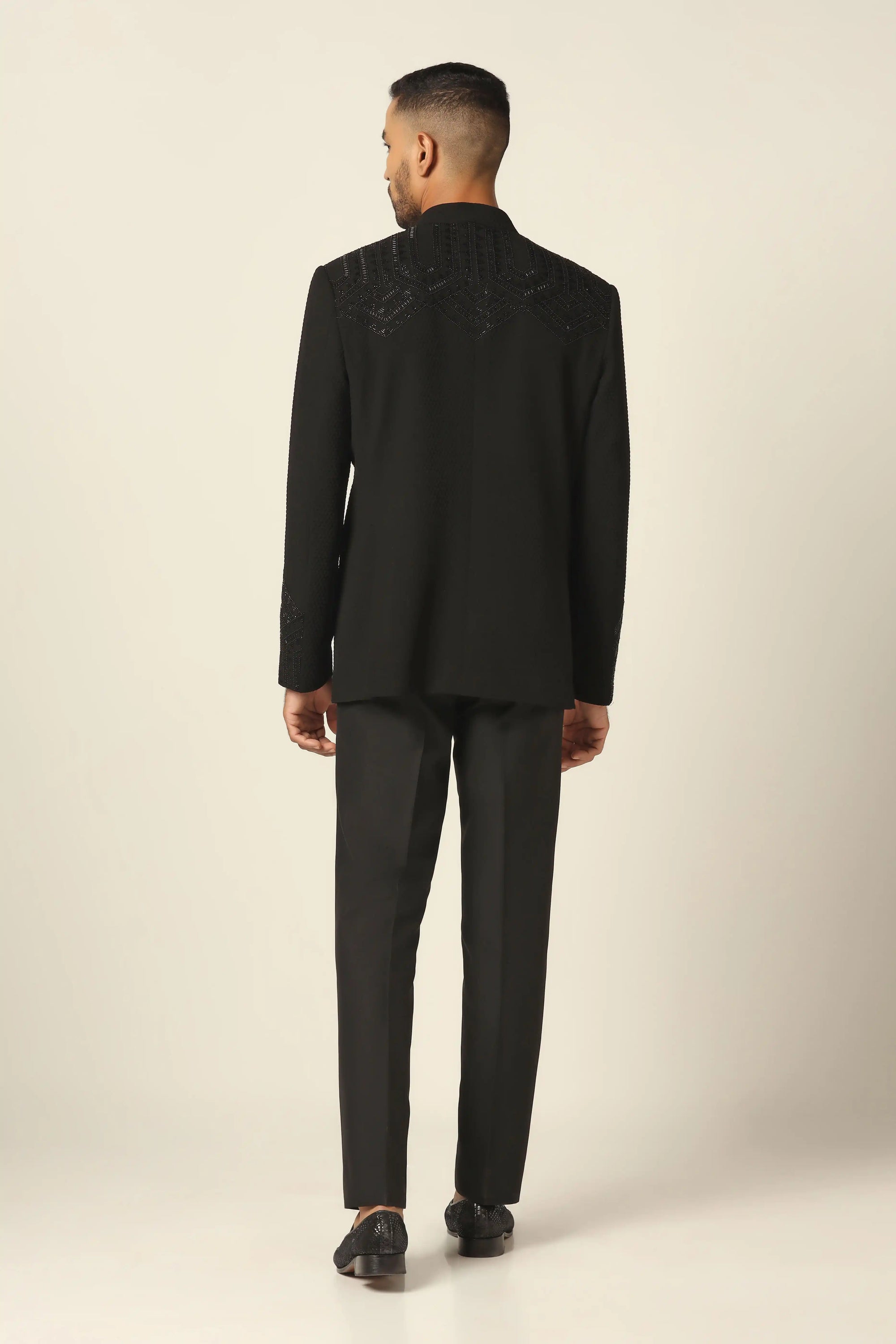 Step into luxury with a black embroidered bandhgala suit, designed for timeless style. Shop now!