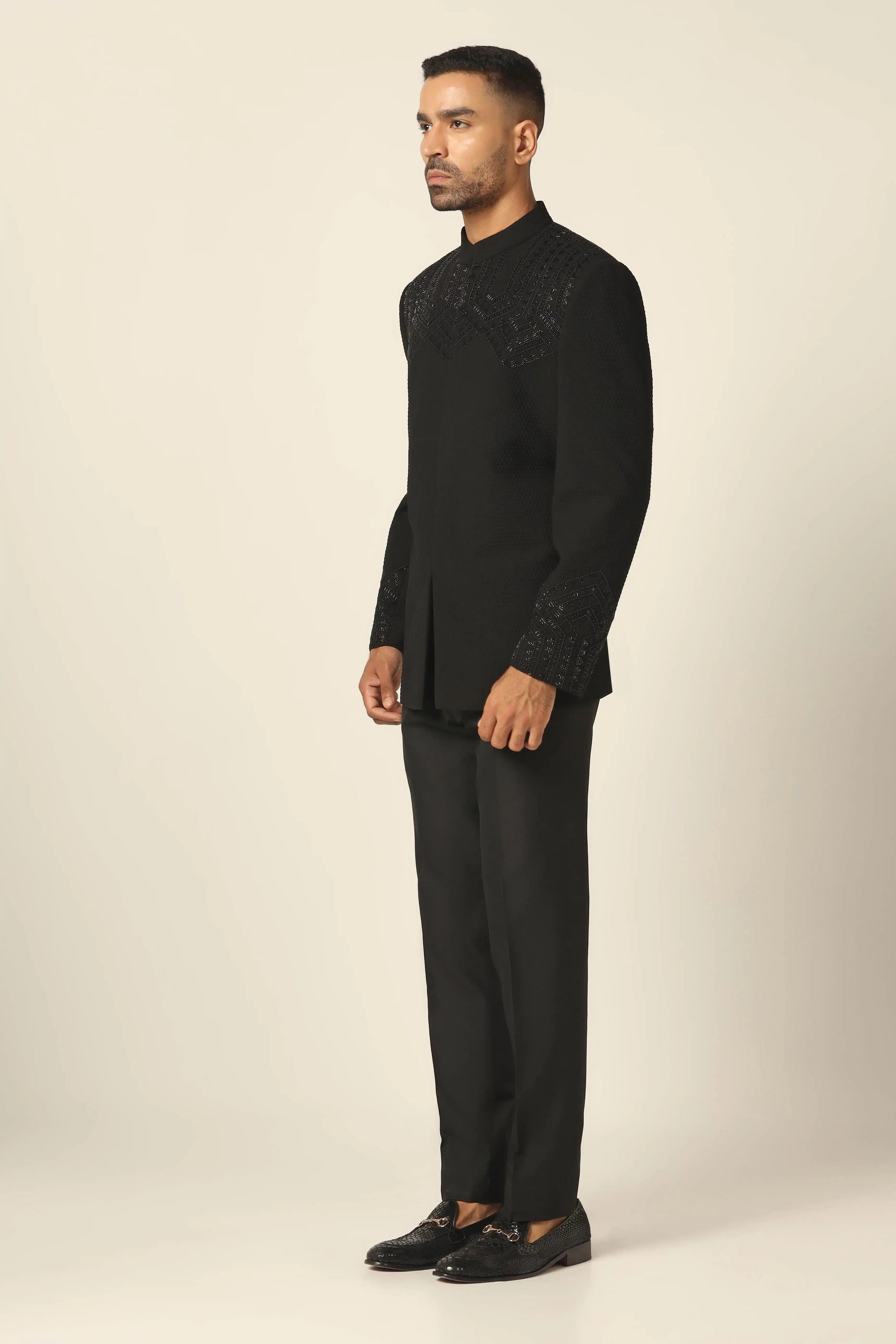 Step into luxury with a black embroidered bandhgala suit, designed for timeless style. Shop now!