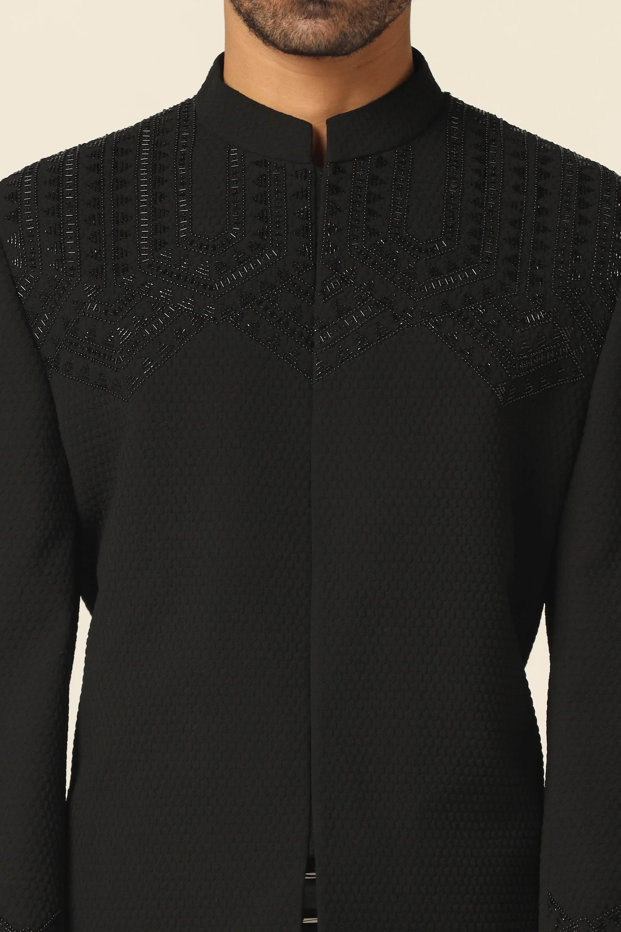 Step into luxury with a black embroidered bandhgala suit, designed for timeless style. Shop now!