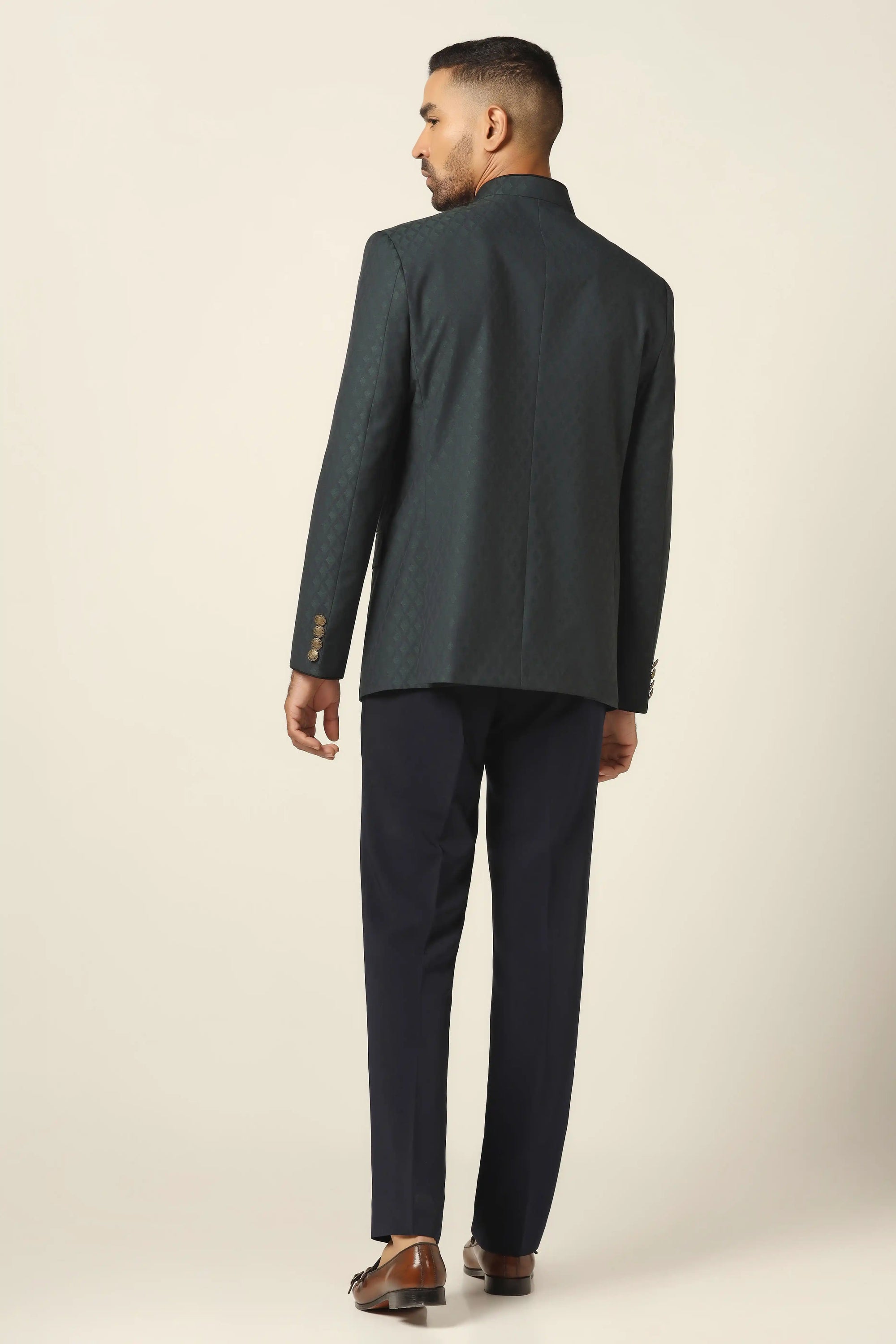 Step into sophistication with a Navy textured bandhgala suit, designed for elegance. Shop Now!
