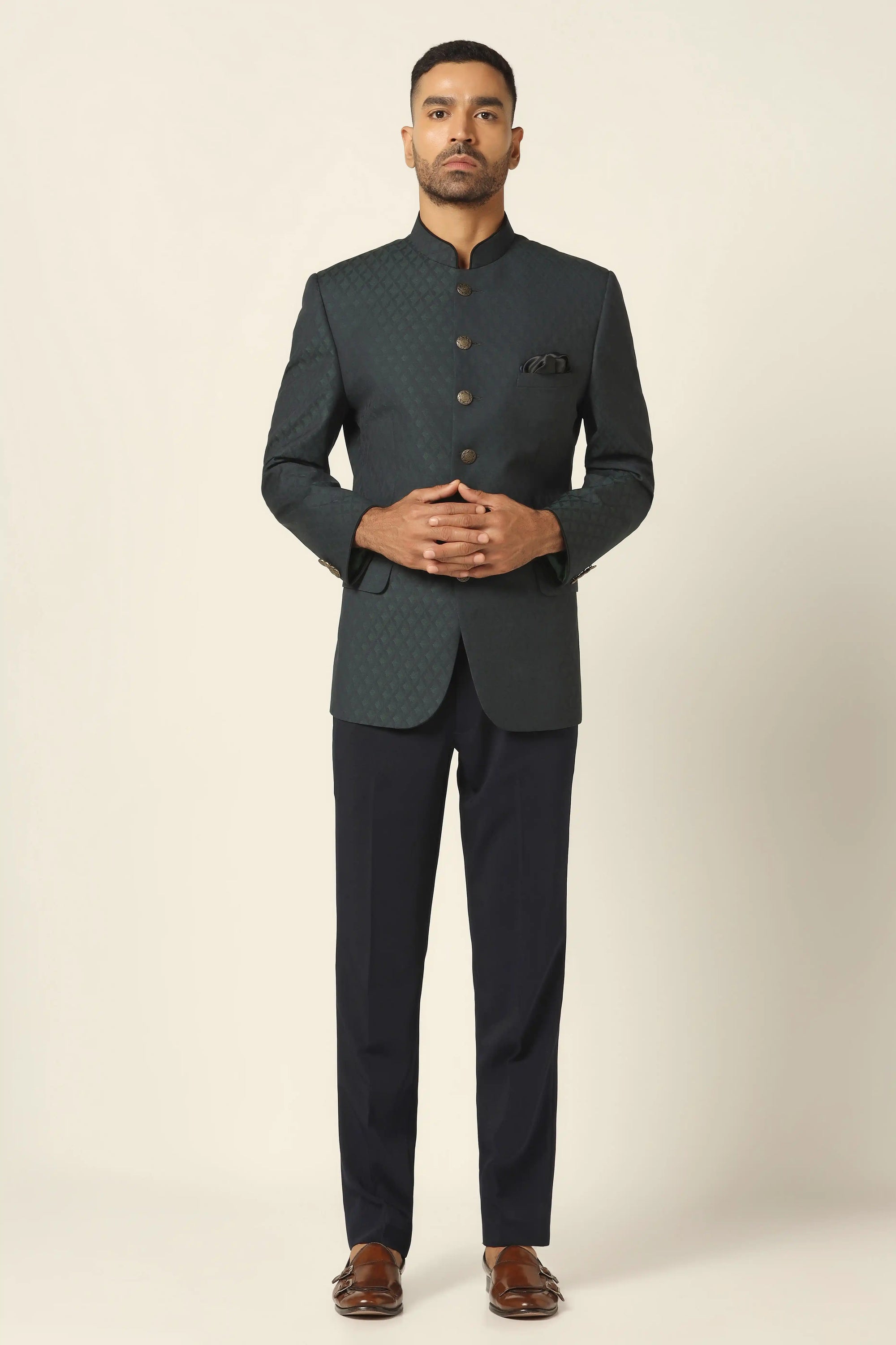 Step into sophistication with a Navy textured bandhgala suit, designed for elegance. Shop Now!