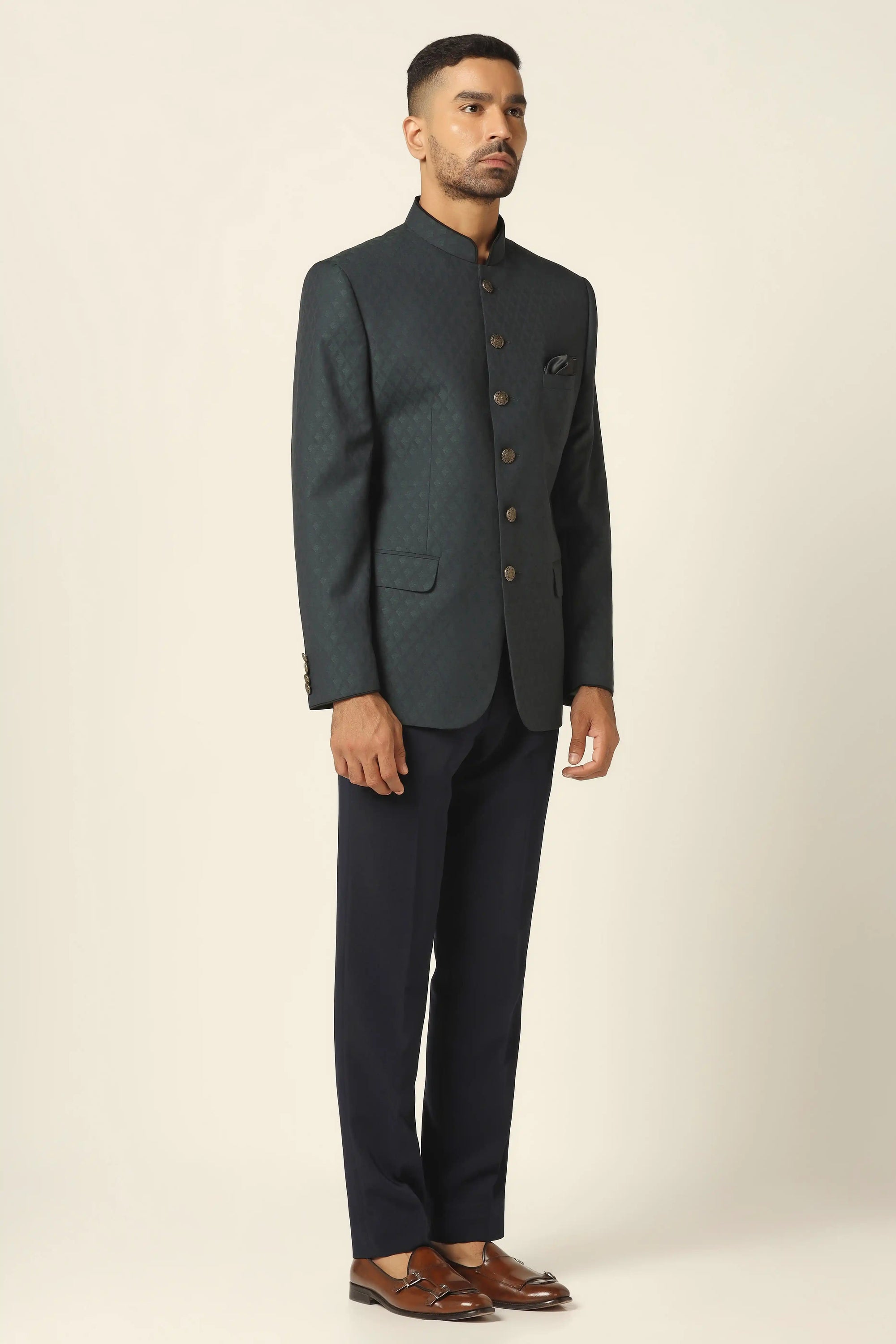 Step into sophistication with a Navy textured bandhgala suit, designed for elegance. Shop Now!