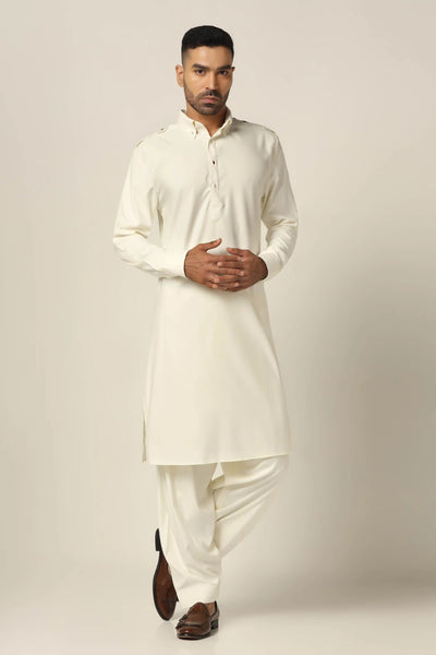 Experience refined elegance in our White Pathani suit, boasting a classic collar neck and shoulder flaps. Complete with a perfectly matched Salwar for a polished look