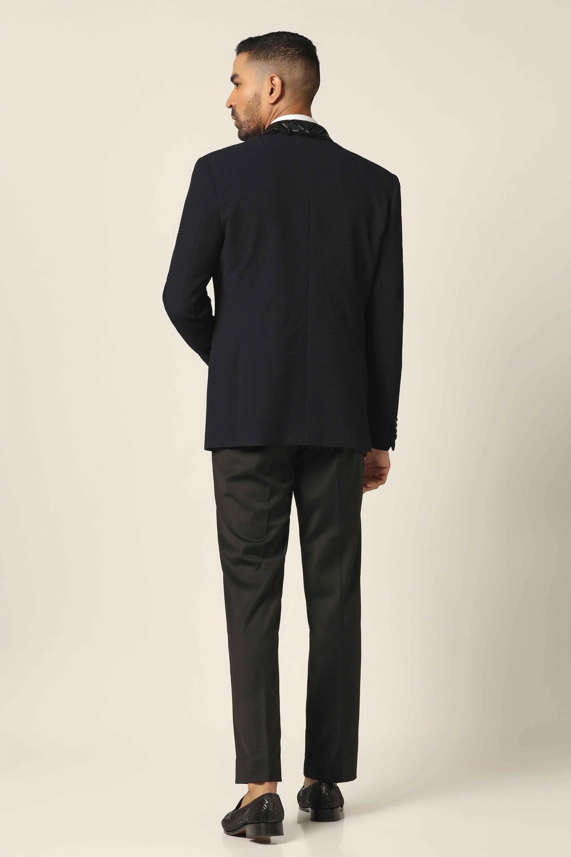 A refined embroidered tuxedo in navy to elevate your wardrobe. Sophistication awaits. Shop now!