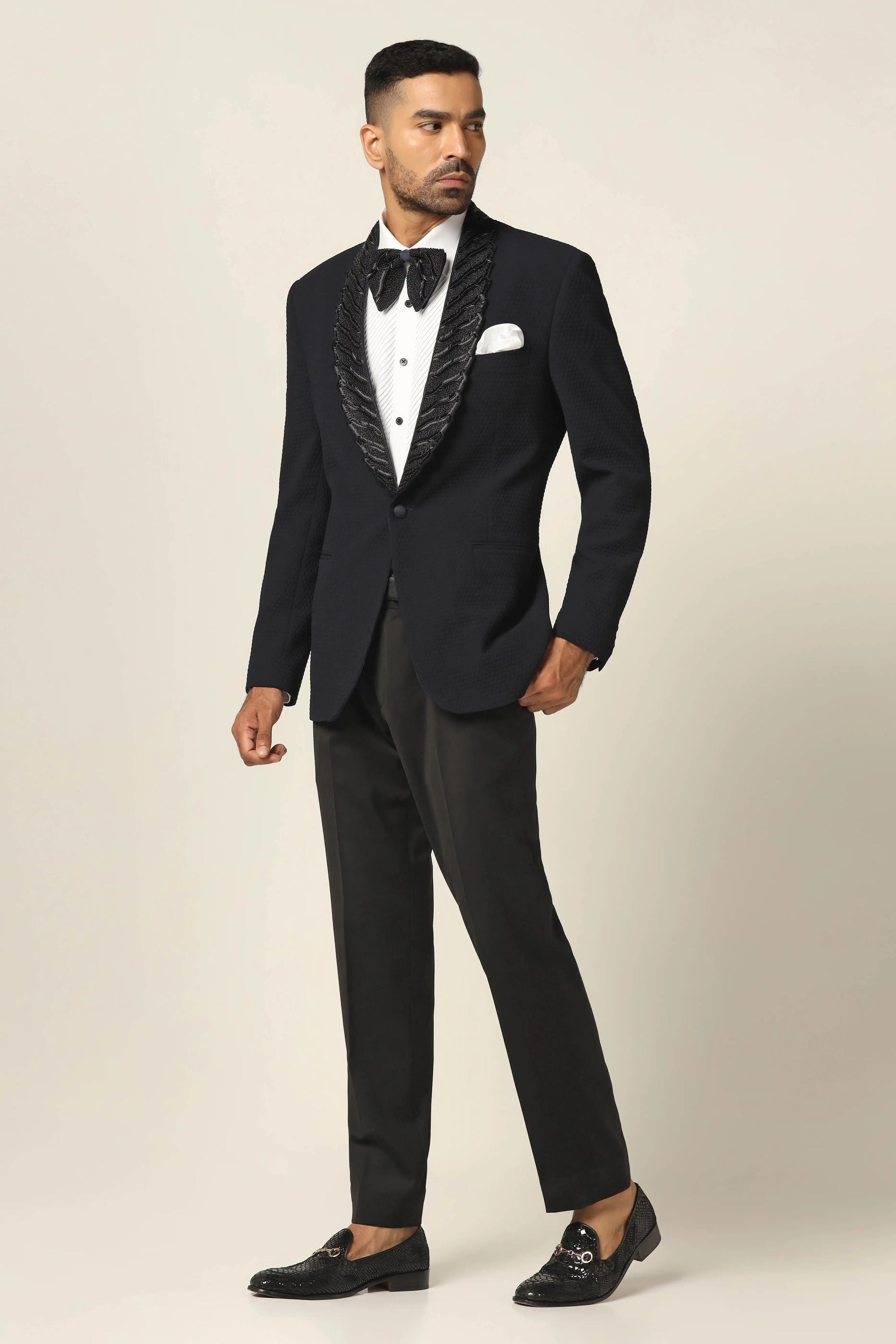 A refined embroidered tuxedo in navy to elevate your wardrobe. Sophistication awaits. Shop now!