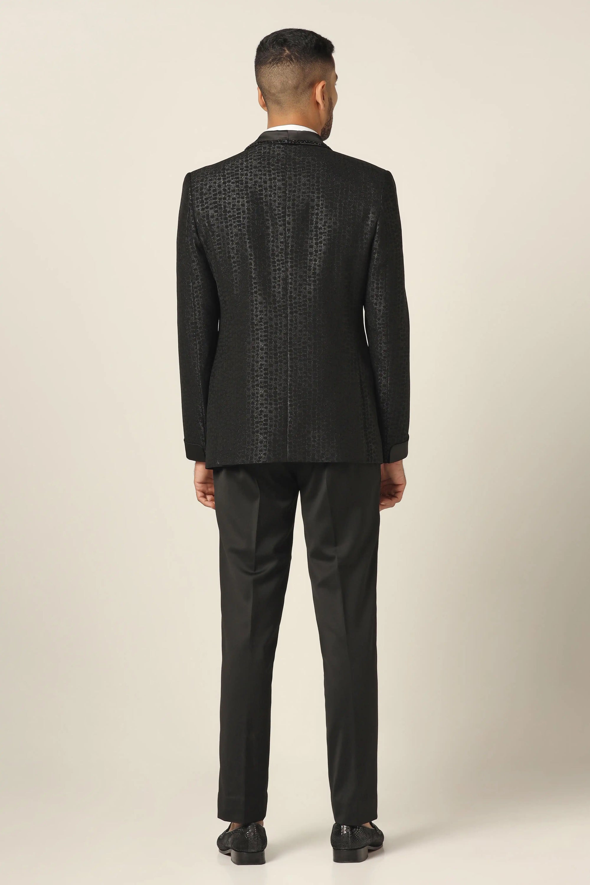 Embrace elegance with the Black Embroidered Tuxedo Suit. Shop now!