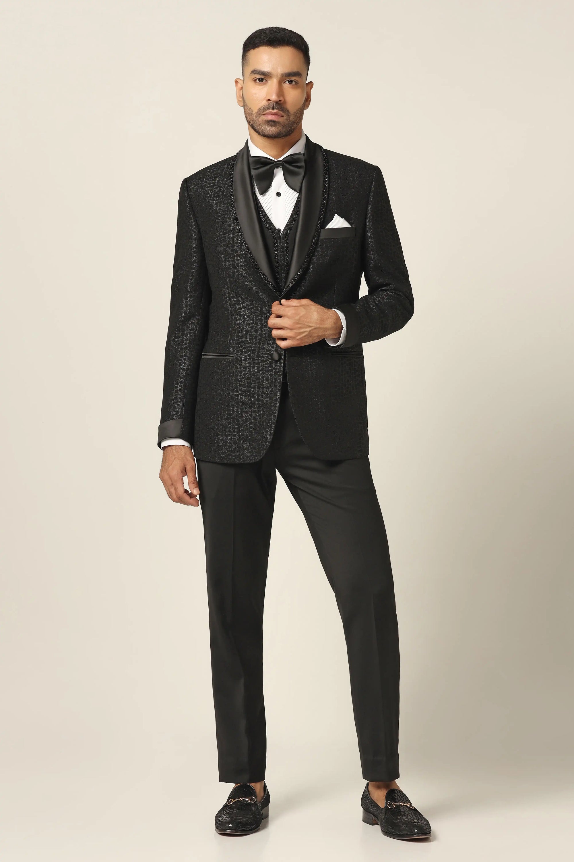 Embrace elegance with the Black Embroidered Tuxedo Suit. Shop now!