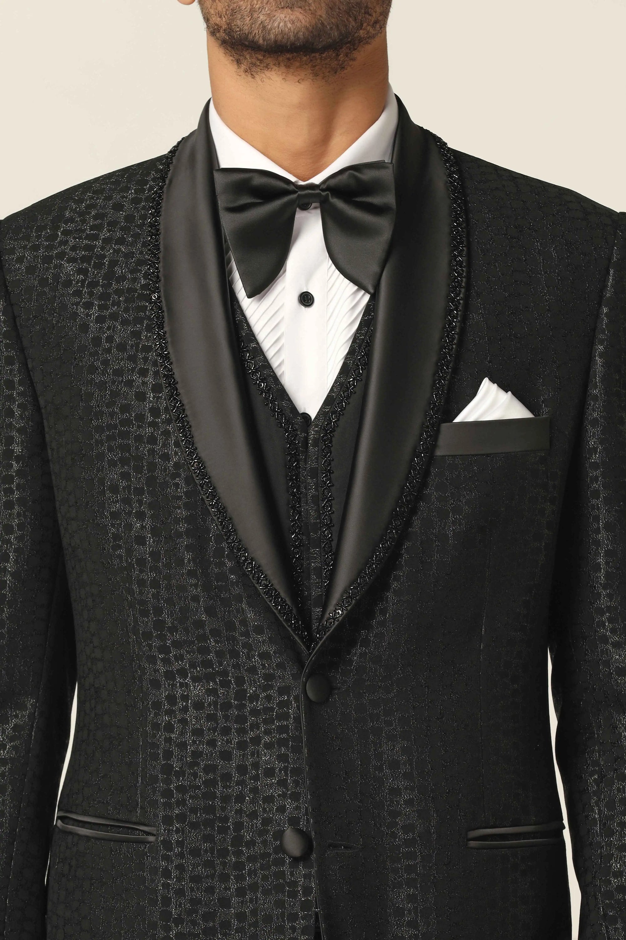 Embrace elegance with the Black Embroidered Tuxedo Suit. Shop now!