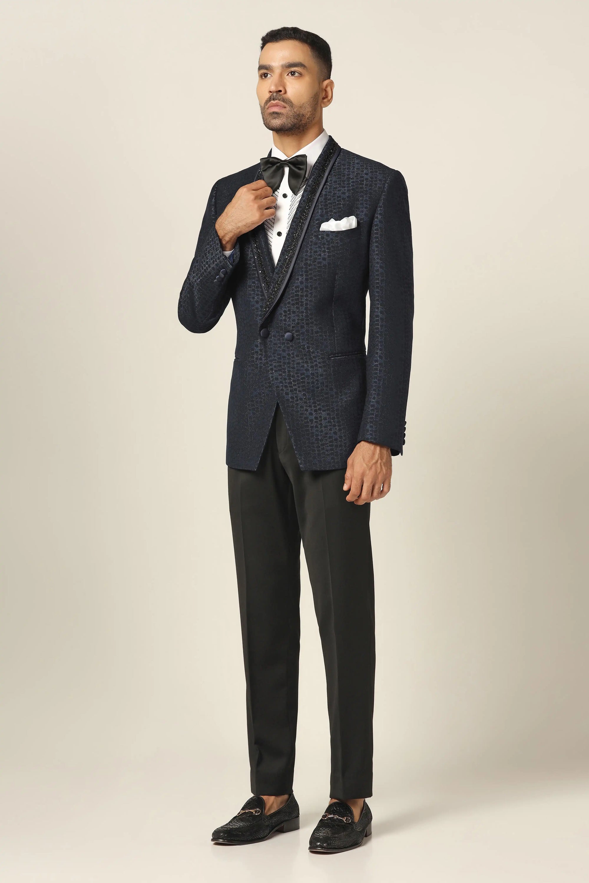 Experience the elegance of the Navy Tuxedo with stunning embroidery. Shop Now!
