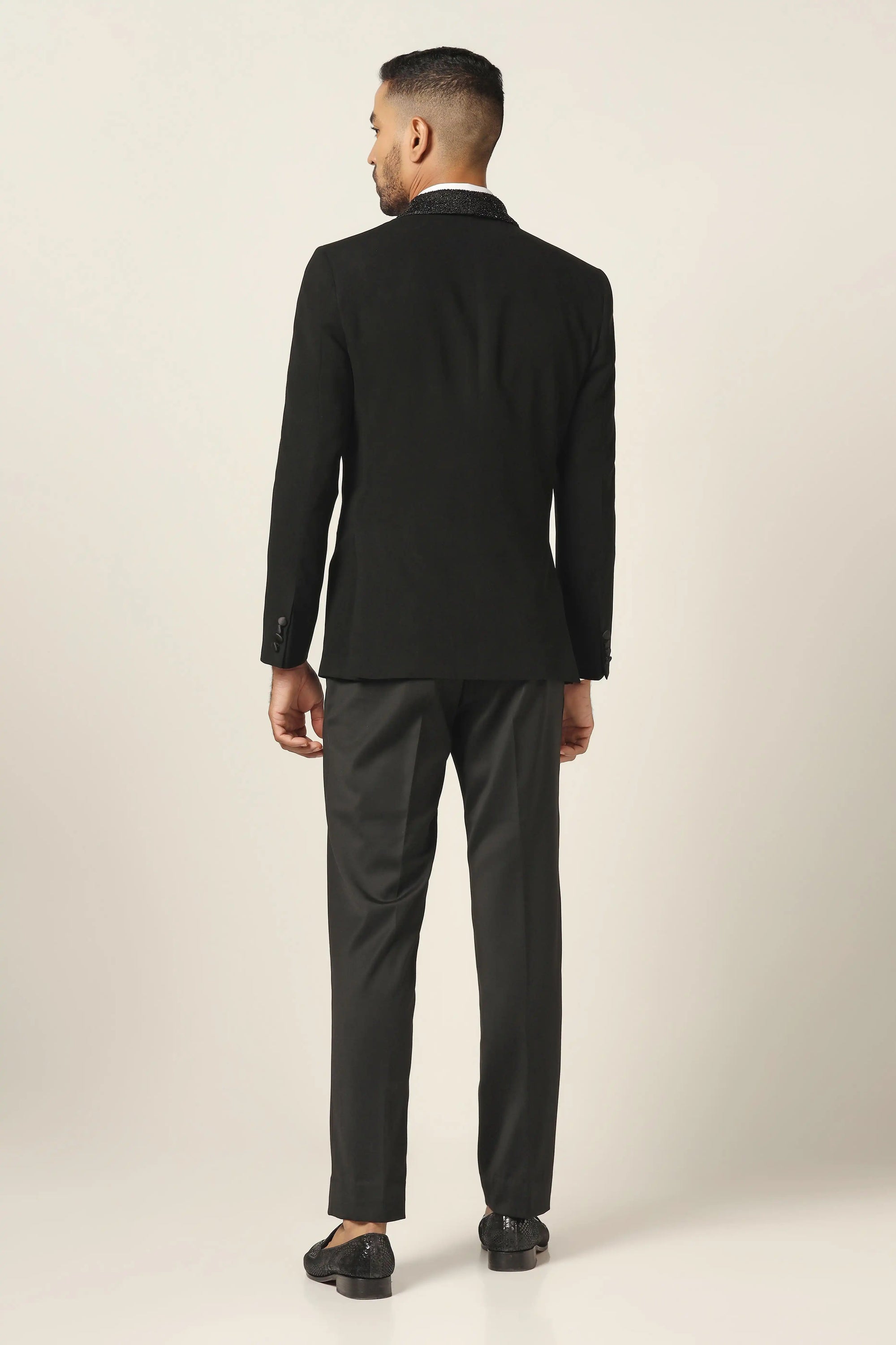 Distinguished elegance in our Navy Tuxedo. Satin shawl collar with subtle embroidery. Shop Now!