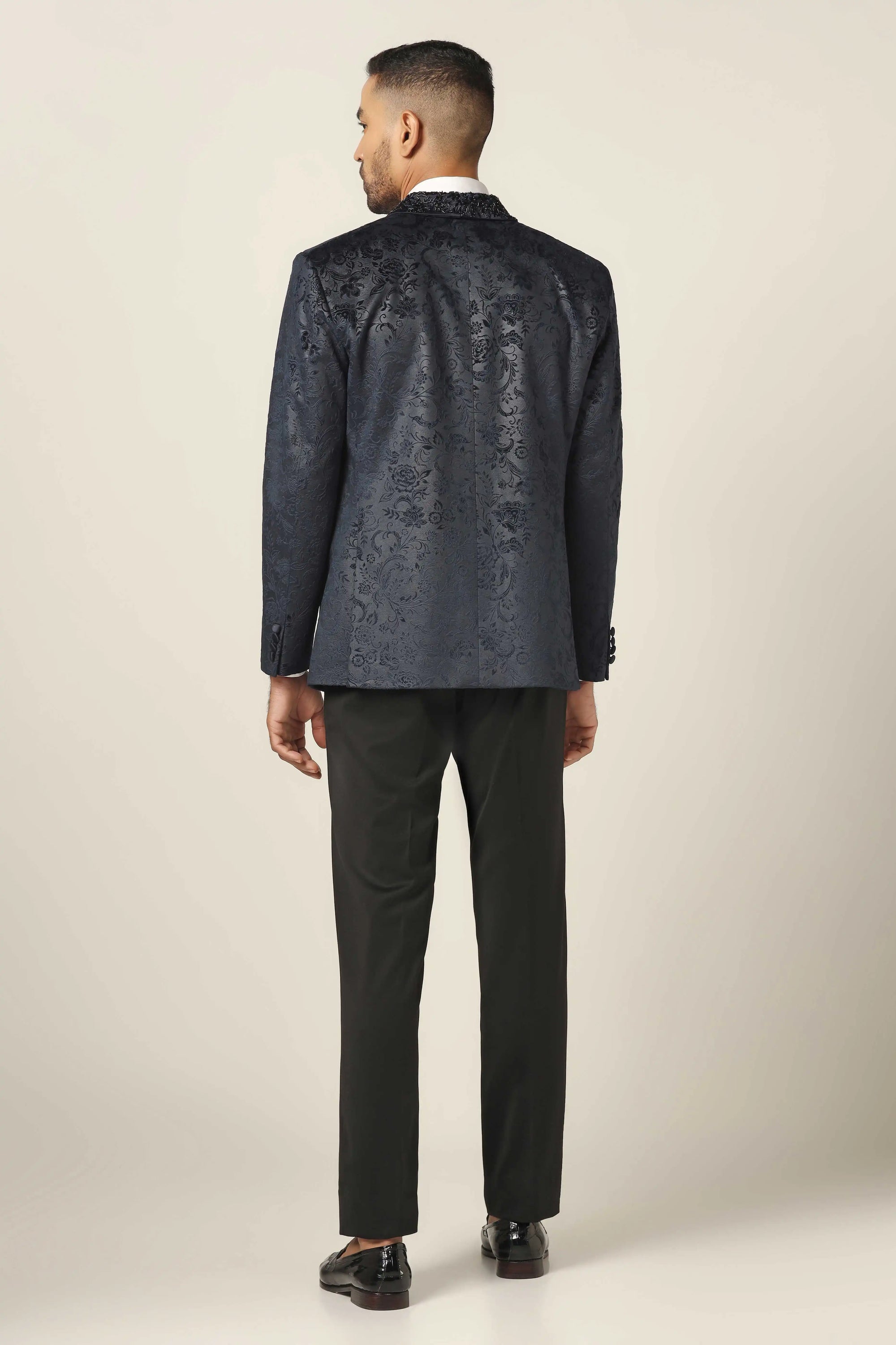 Make an impression with the stunning Navy embroidered tuxedo. Shop now!