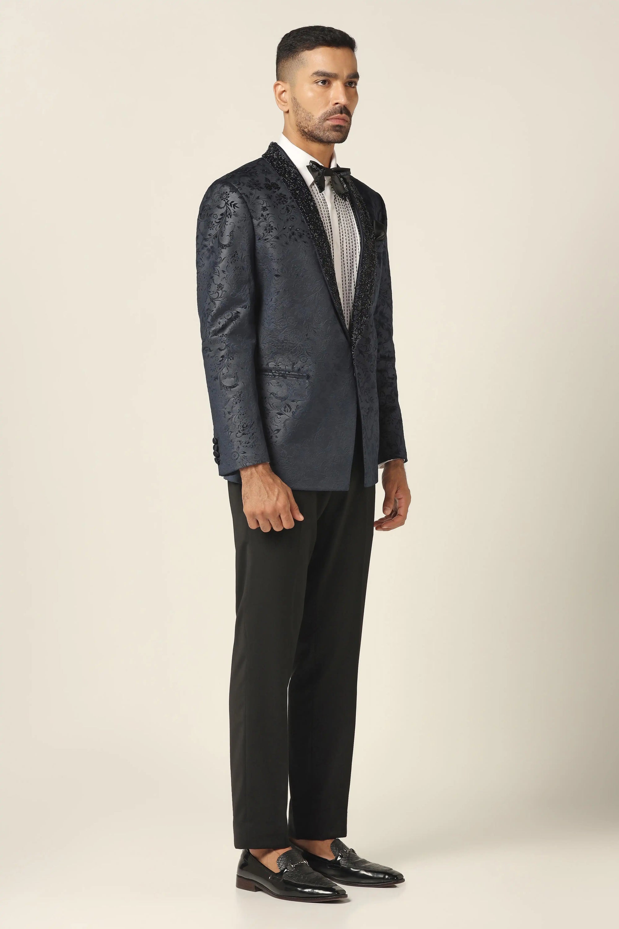 Make an impression with the stunning Navy embroidered tuxedo. Shop now!