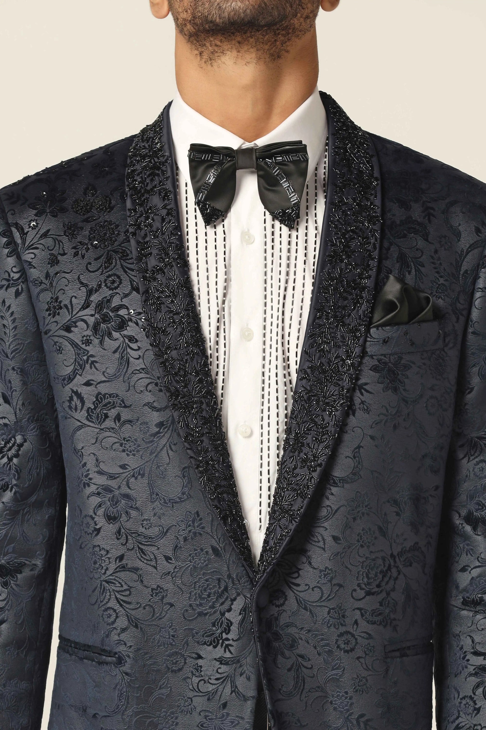 Make an impression with the stunning Navy embroidered tuxedo. Shop now!