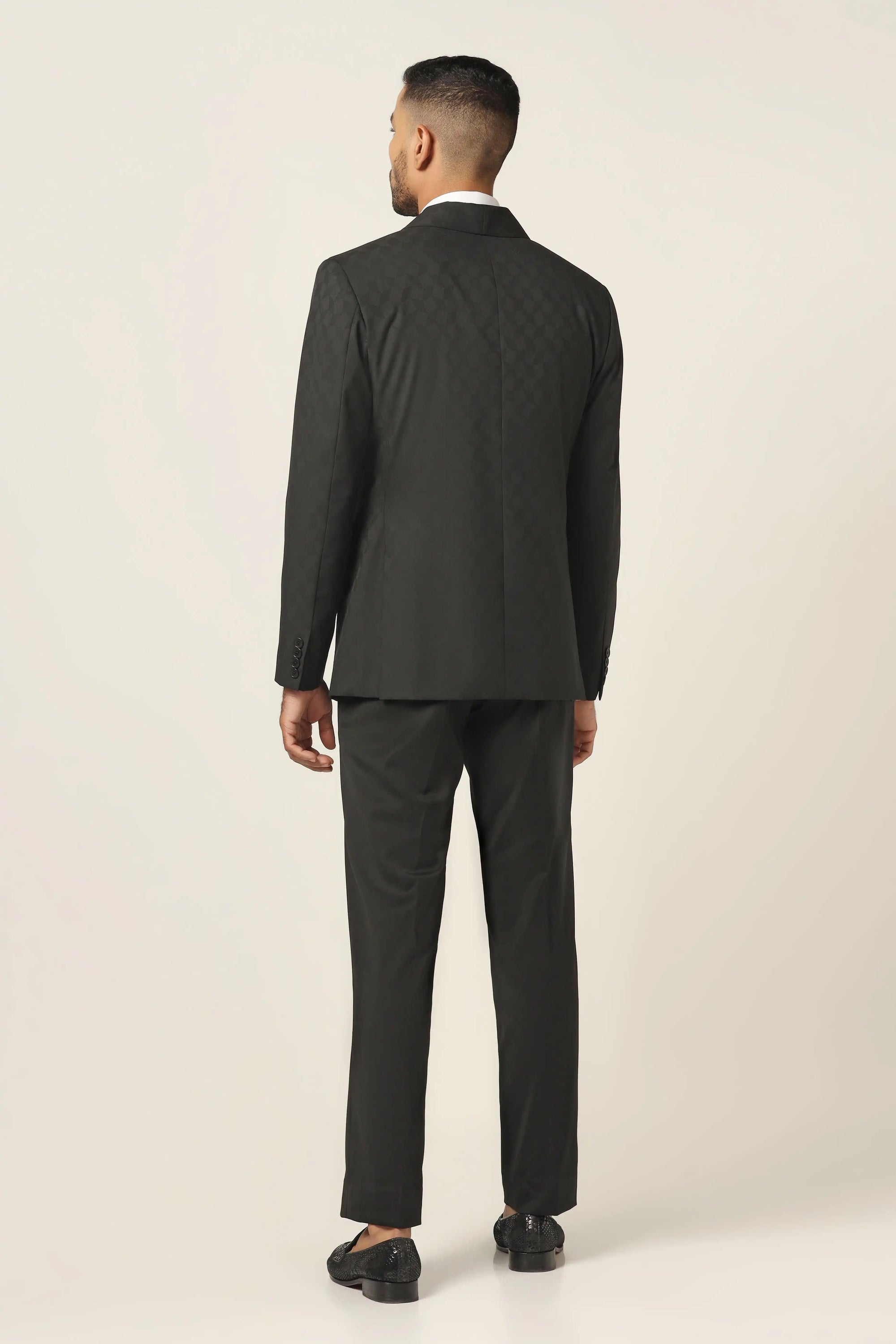 Refined elegance in our textured Black Tuxedo. Shop Now!