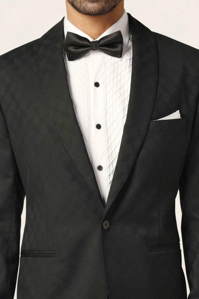Refined elegance in our textured Black Tuxedo. Shawl collar seamlessly matches the fabric. Shirts, trousers, and bows sold separately.