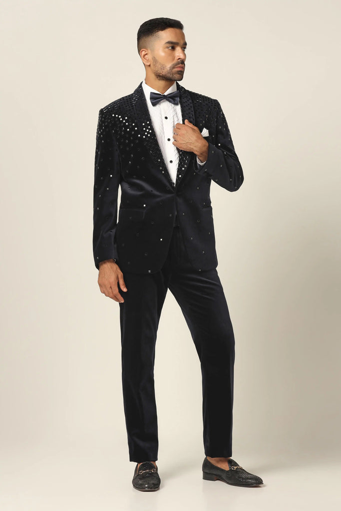 Dazzle in our Cotton Velvet Tuxedo with stunning Mirror embroidery. Jet black Trouser completes the ensemble for a bold and sophisticated look.